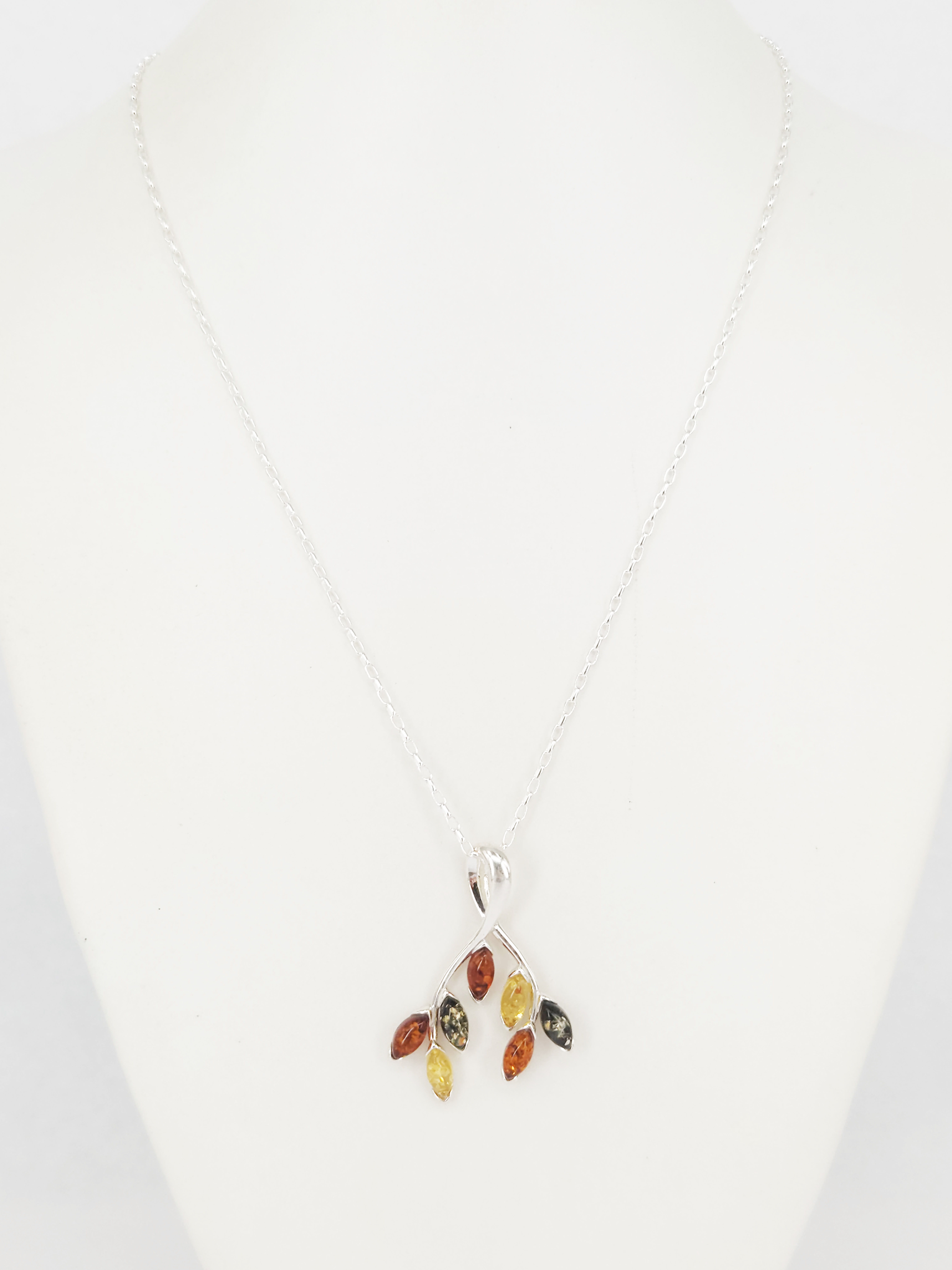 A Sterling Silver And Polish Amber Pendant Necklace