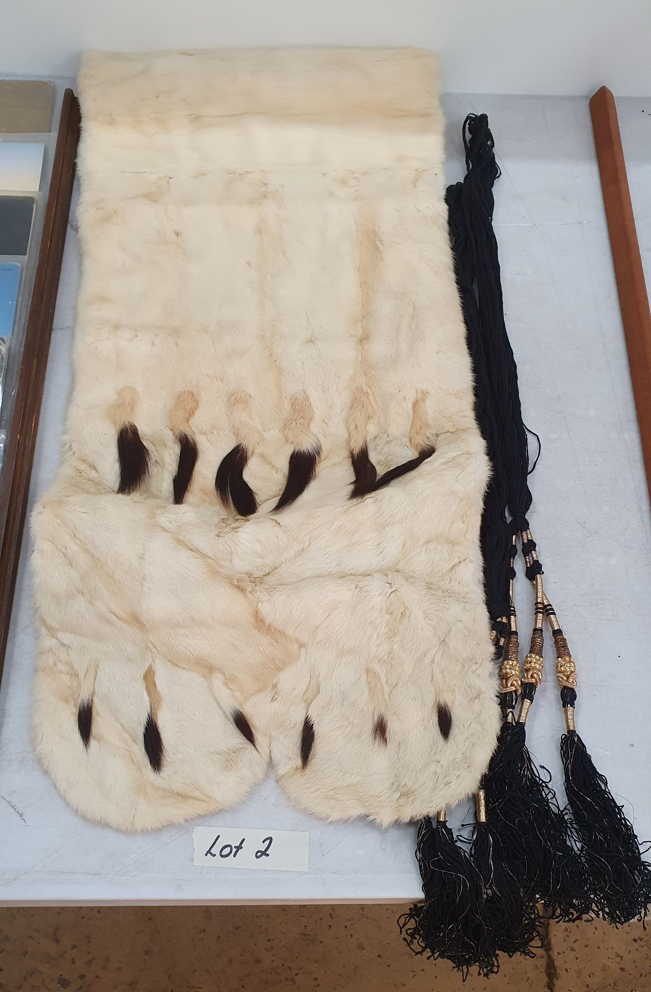 2 · A FUR STOLE AND A PAIR OF CURTAIN TIES