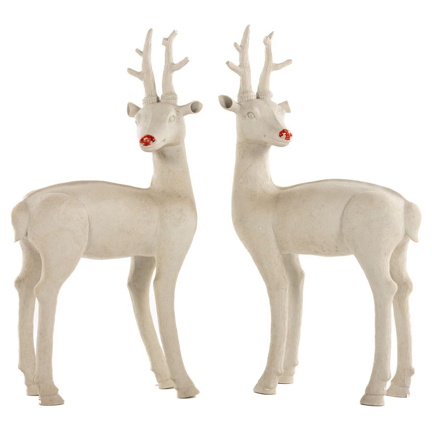 A Large Near Pair of Porcelain Deer
