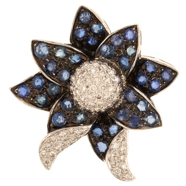 A Sapphire & Diamond Flower Pendant in 18K