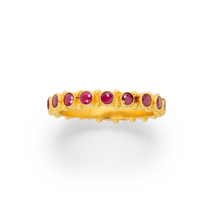 A ruby and eighteen karat gold ring