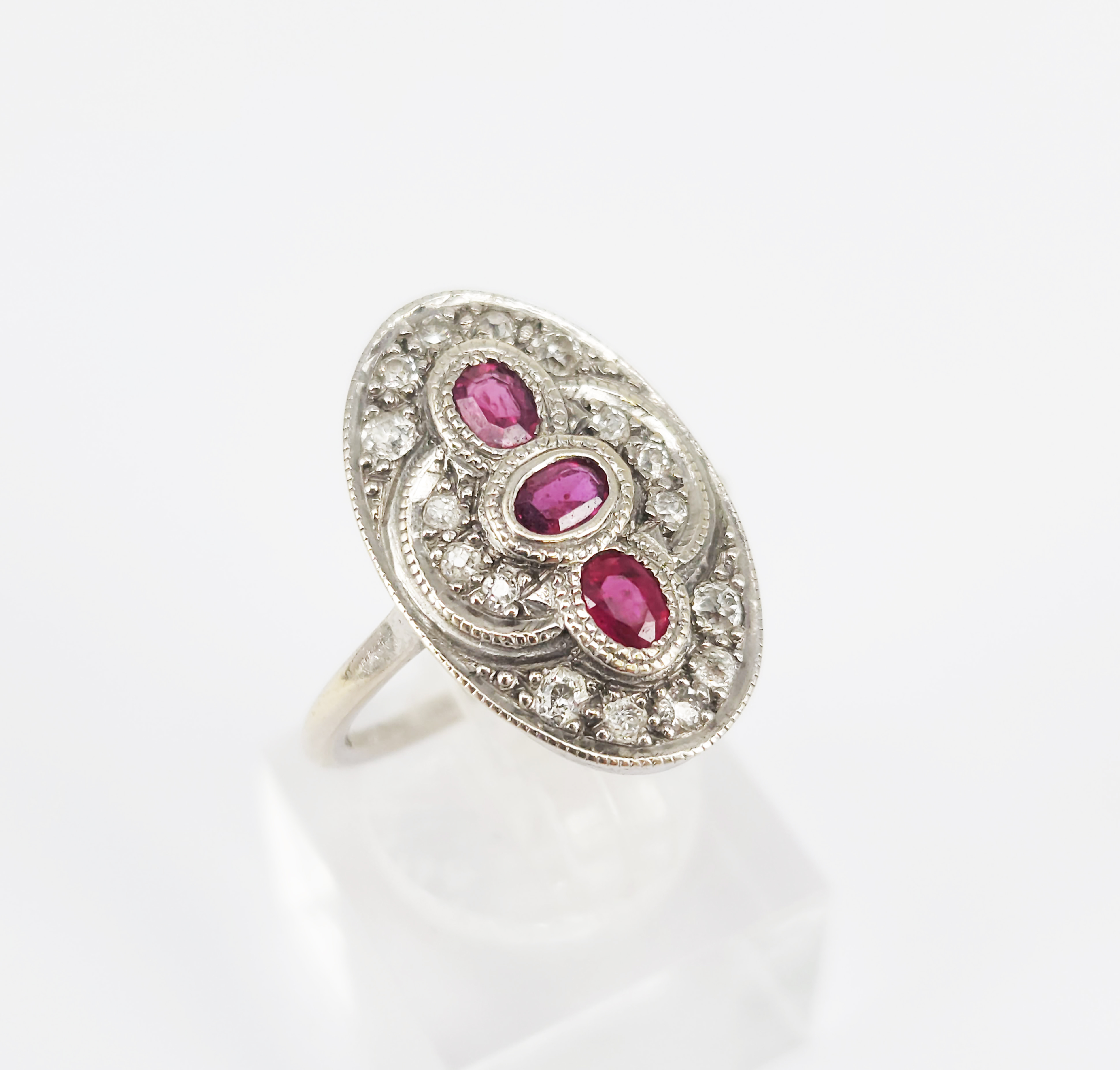 214 · AN ART DECO DIAMOND AND PINK TOPAZ 9ct WHITE GOLD RING