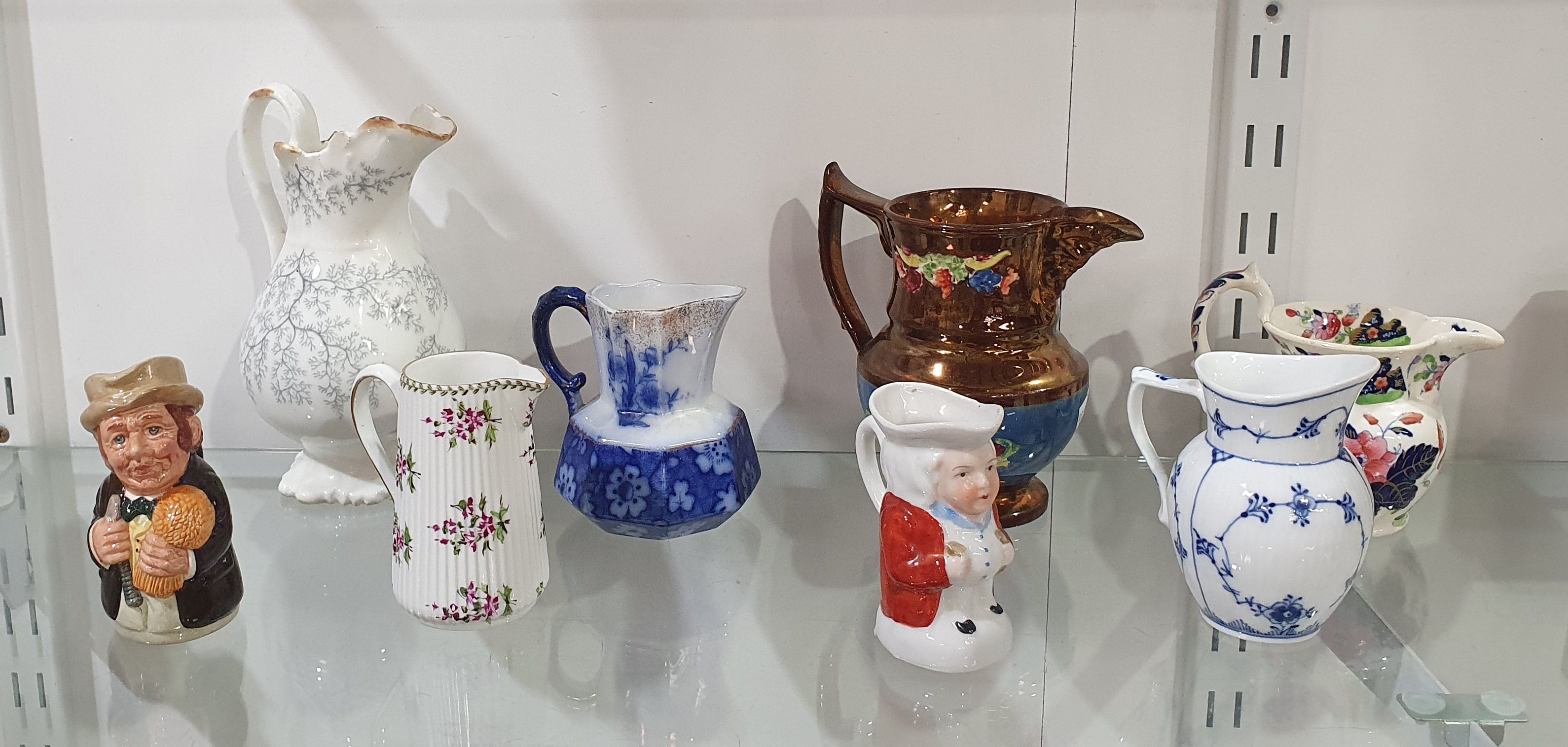 A Group Of Various Jugs