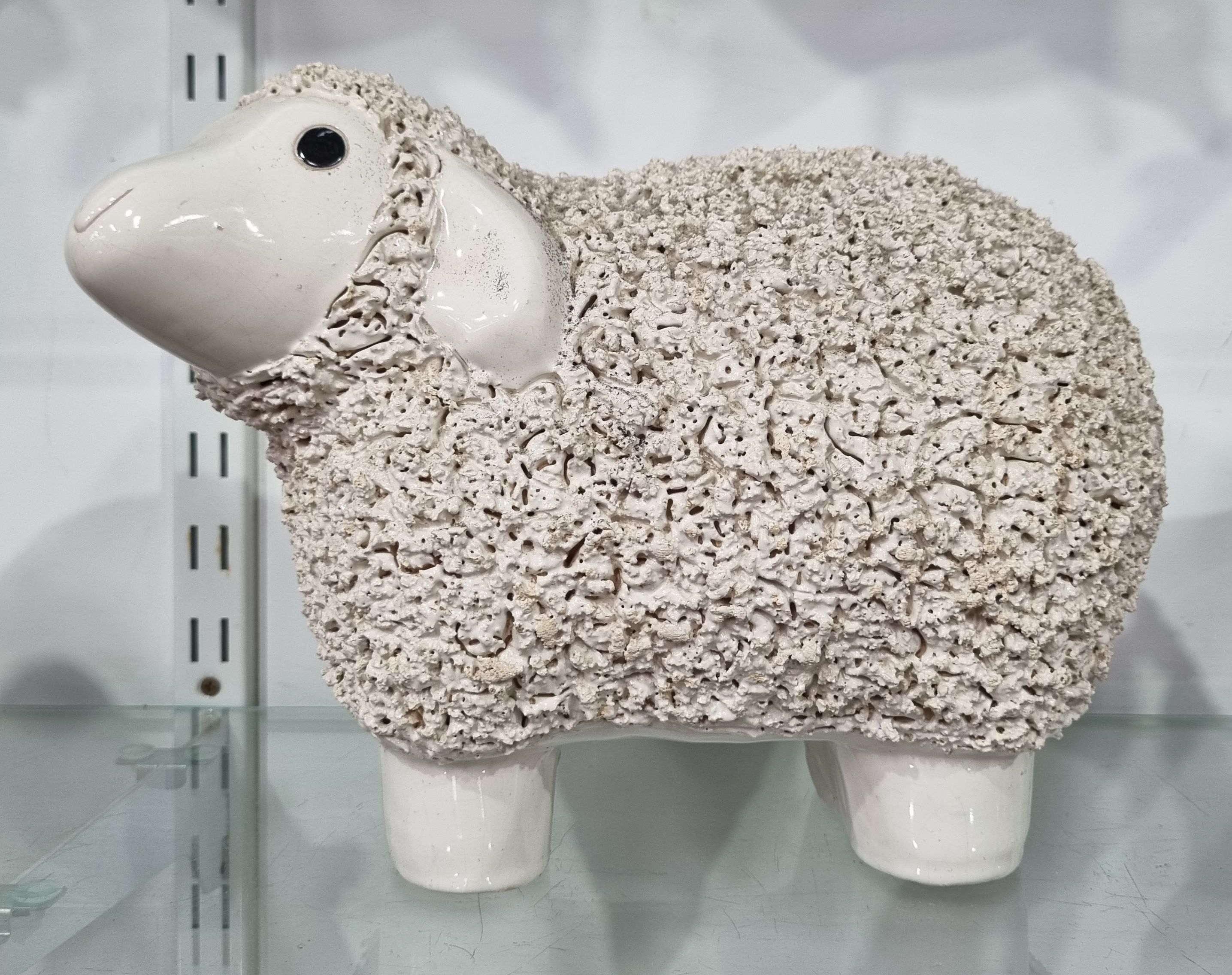 A Ceramic Figure Of A Woolly Sheep