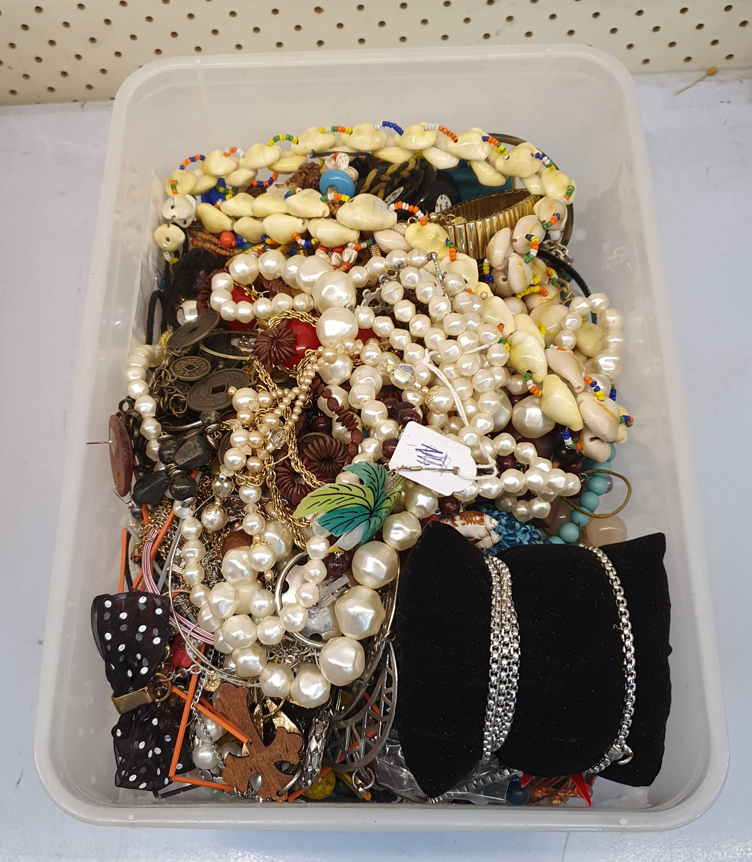 A TUB OF COSTUME JEWELLERY