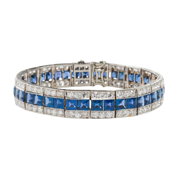A synthetic sapphire, diamond and platinum bracelet