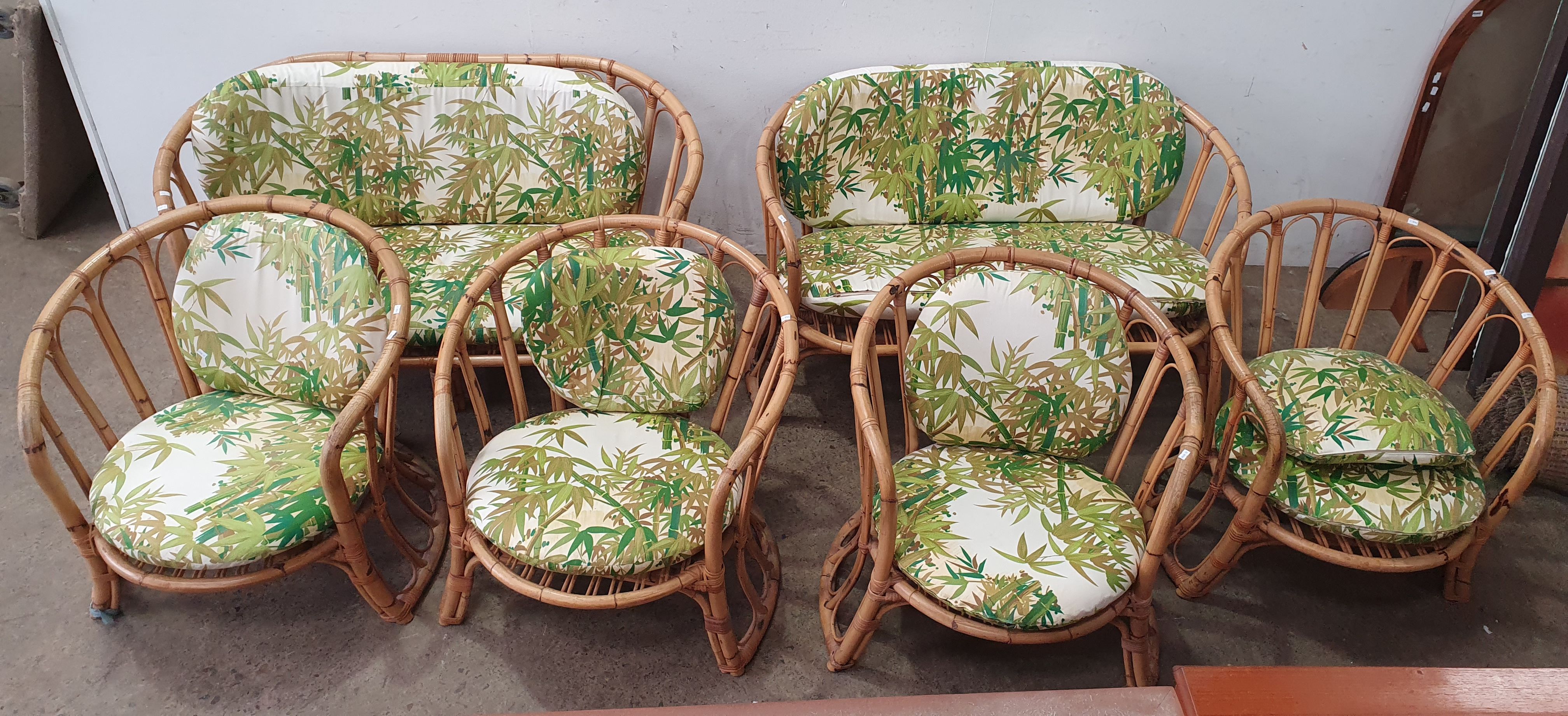 1065 · A SIX PIECE CANE OUTDOOR SETTING