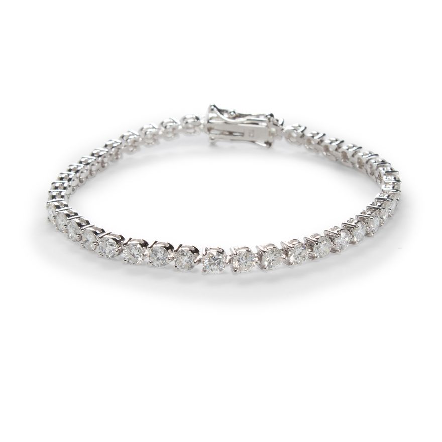 A diamond and eighteen karat white gold bracelet