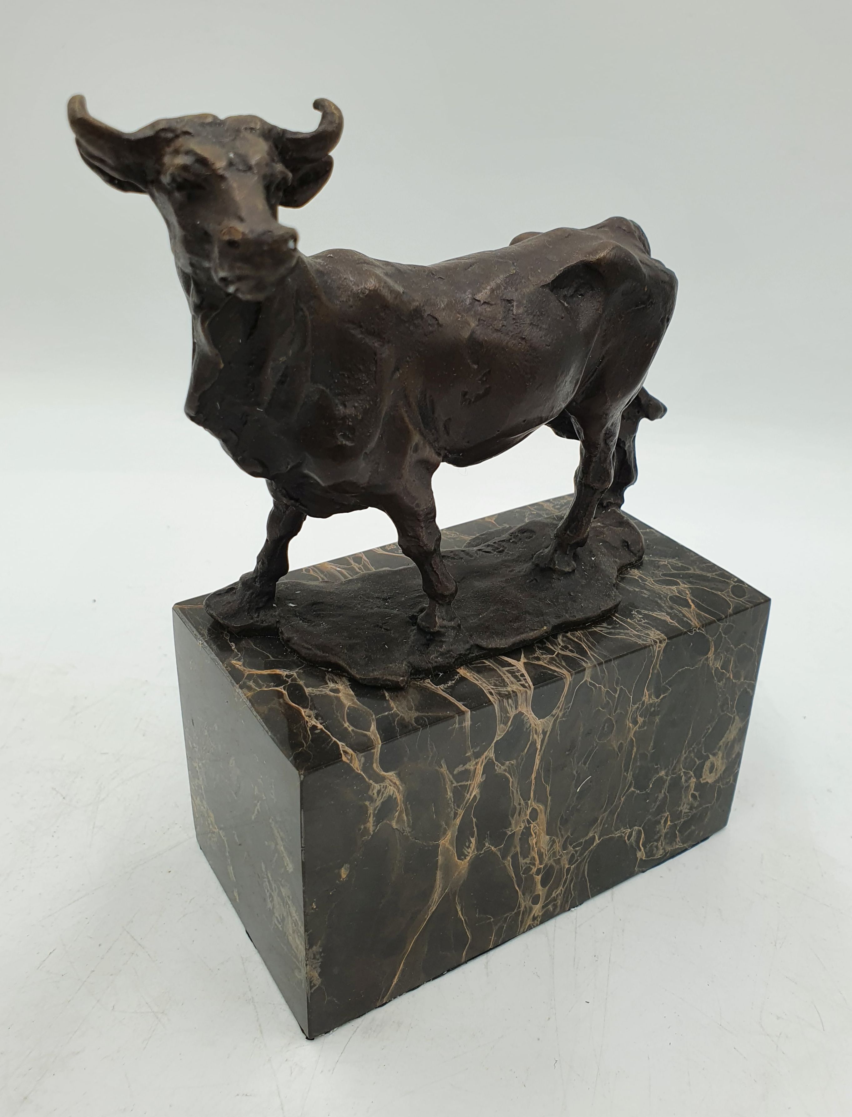 710 · A BRONZED FIGURE OF A COW AFTER LOUIS CARVIN
