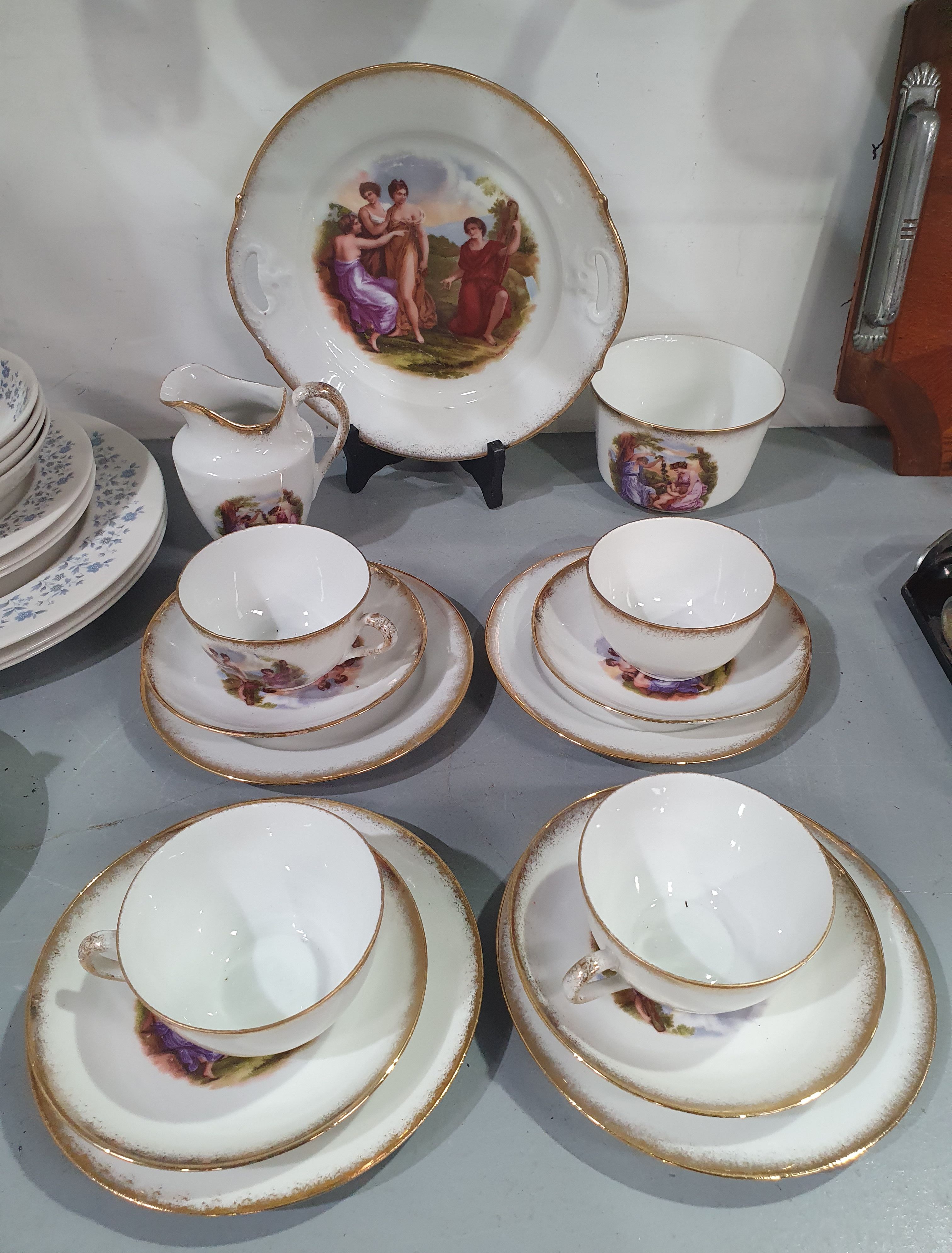 566 · A BOHEMIAN PORCELAIN 'ANGELICA KAUFFMAN' TEASET