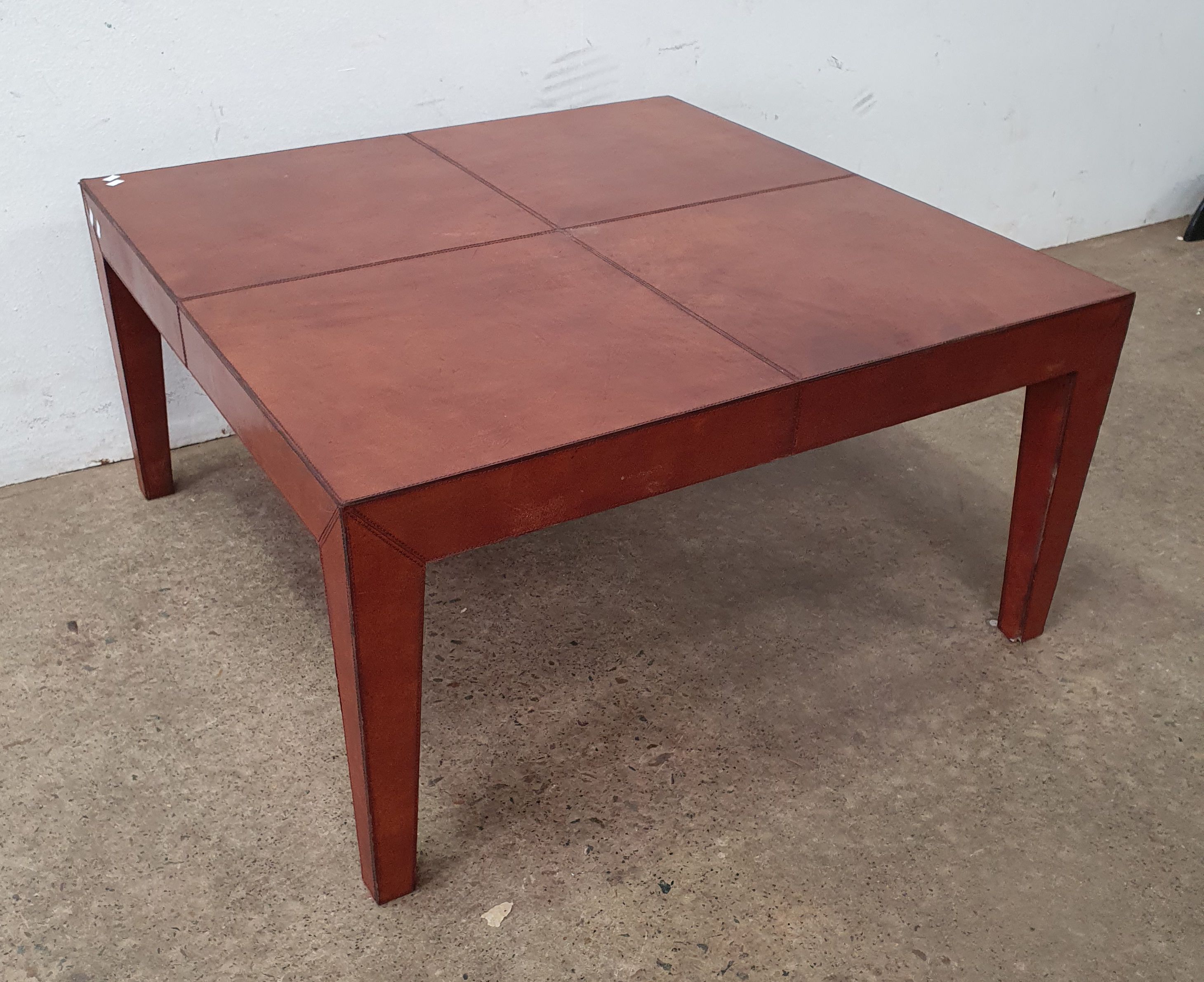 A Leather Covered Coffee Table