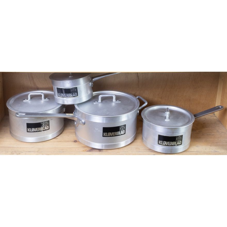 A set of four Danish Kloverblad aluminum covered pots and saucepans