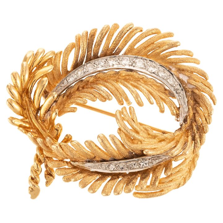A 1960's Diamond Spiral Leaf Brooch in 14K