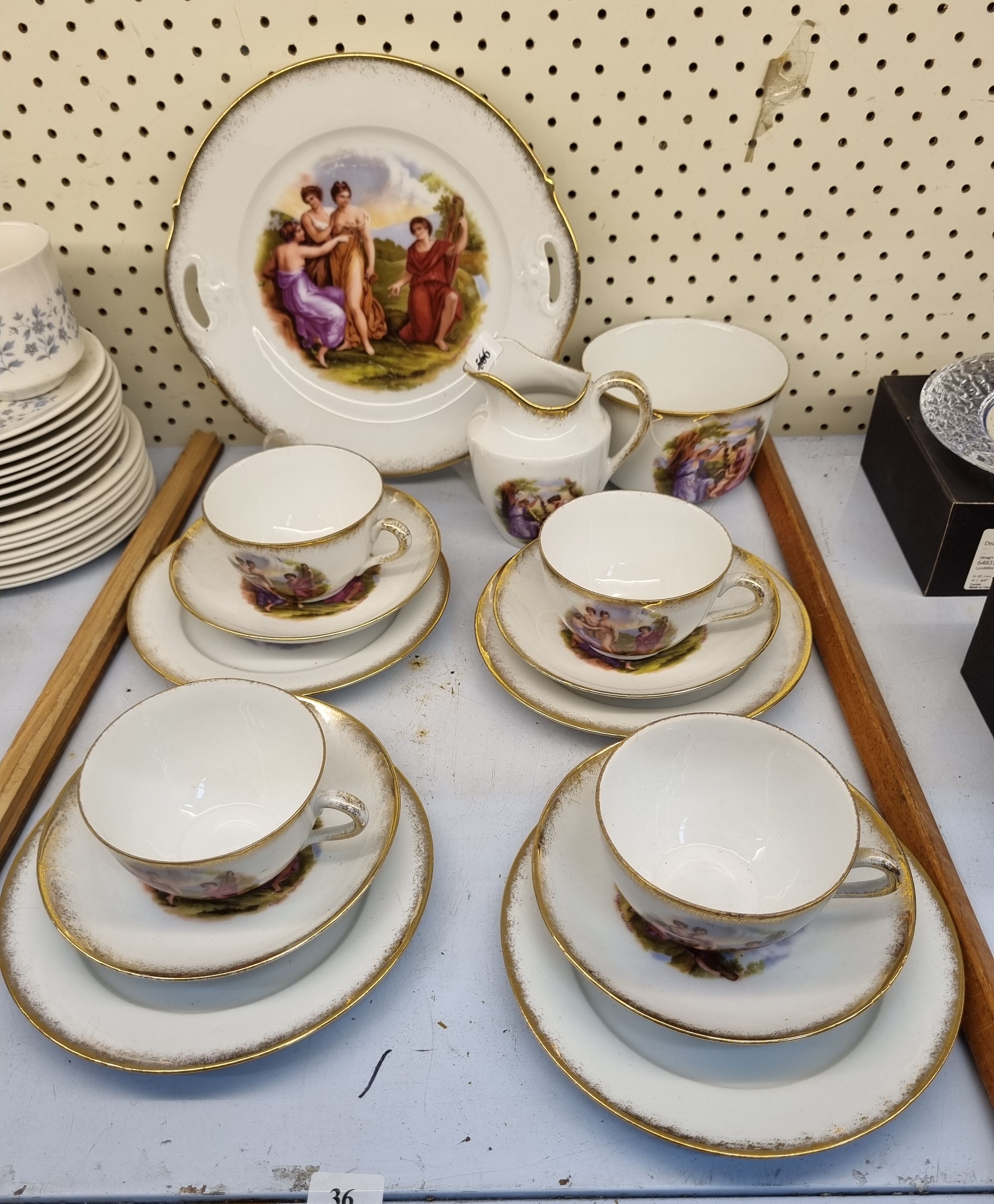 36 · A BOHEMIAN PORCELAIN 'ANGELICA KAUFFMAN' TEASET