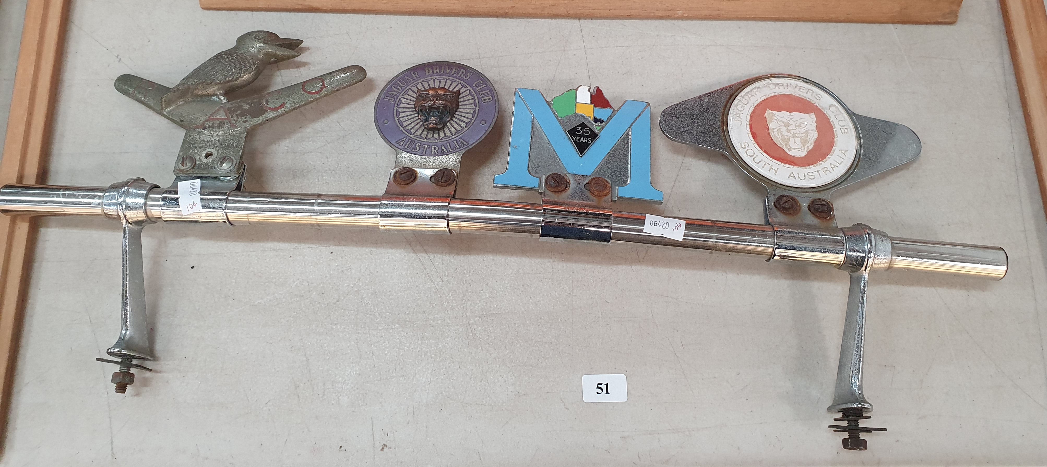 51 · FOUR CLUB CAR BADGES