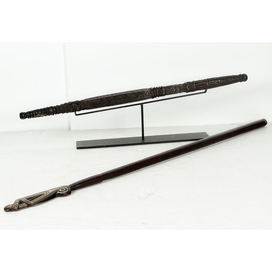A Nepalese carved wood chieftain staff, 19th century, suspended on a modern metal stand, 28"l