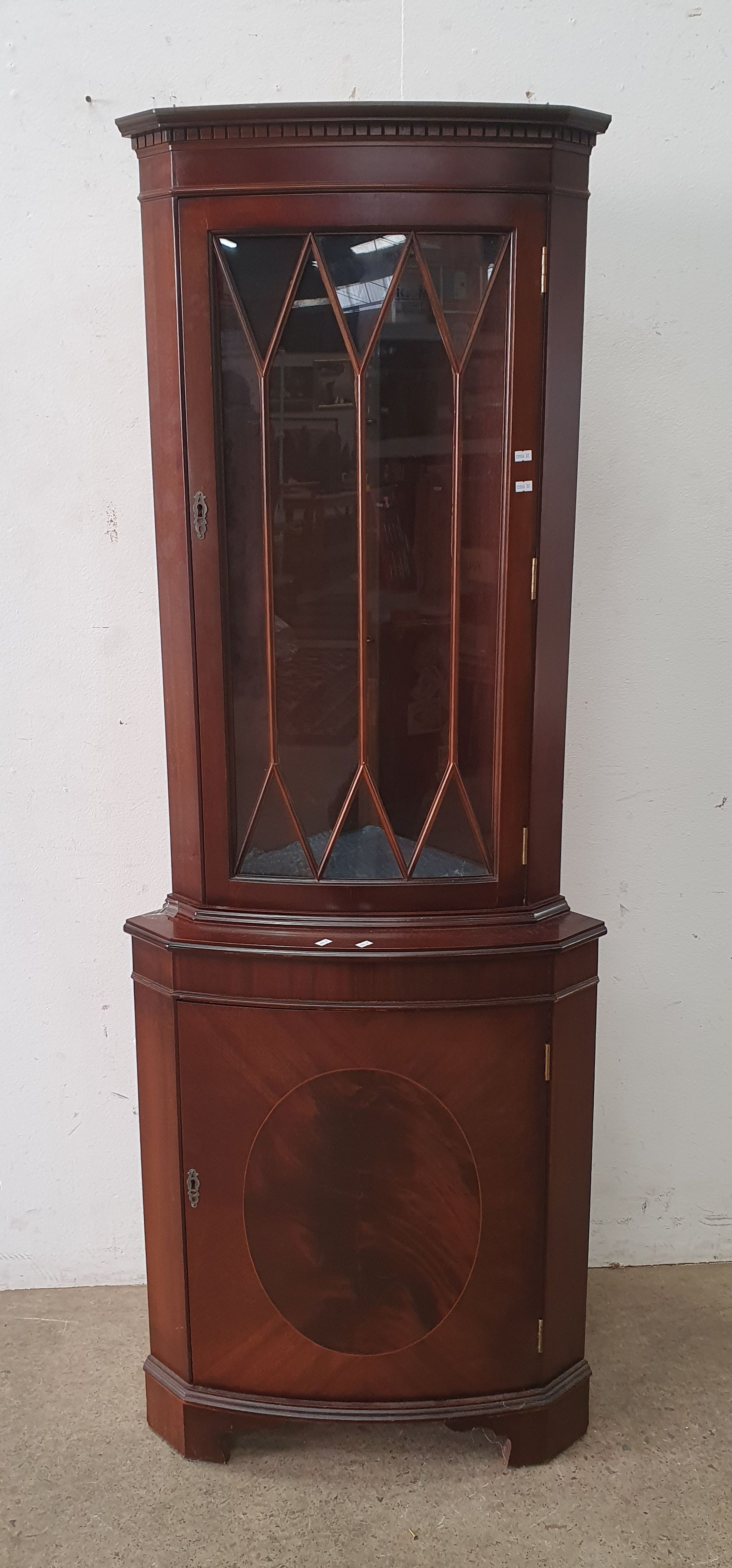 2213 · A MAHOGANY CORNER CABINET