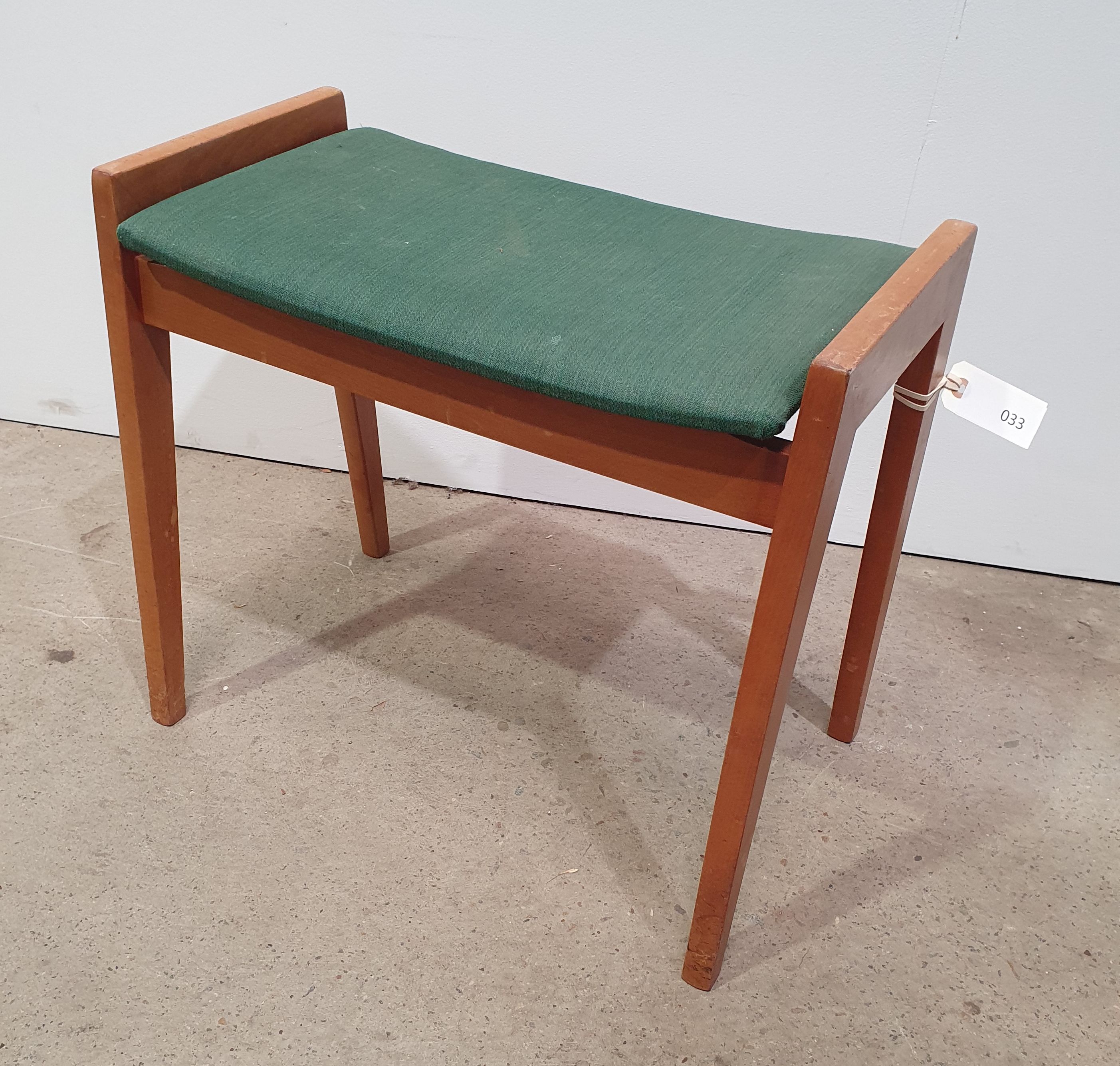 An Upholstered Fabric Mcm Green Stool