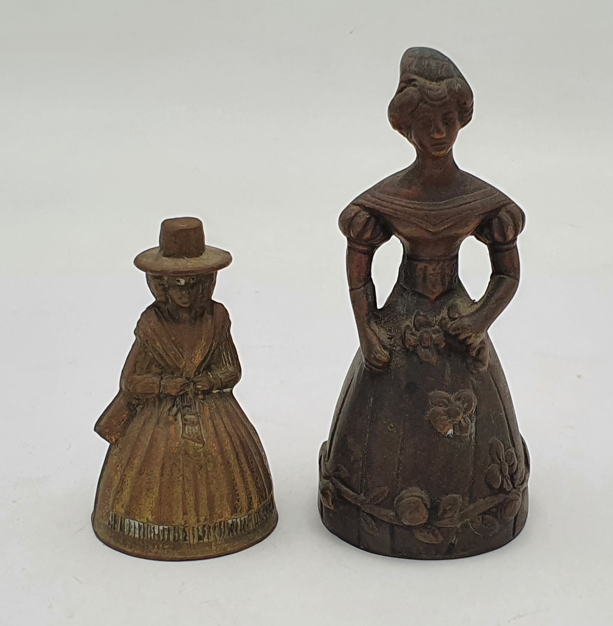 Two Brass Figural Bells