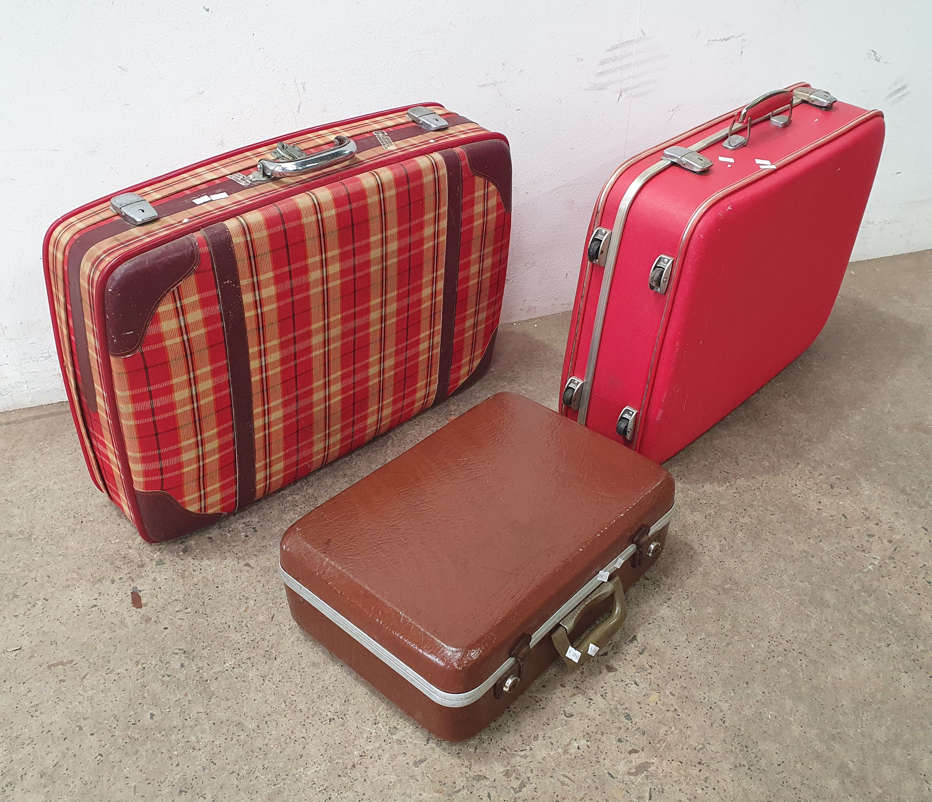 THREE VINTAGE SUITCASES