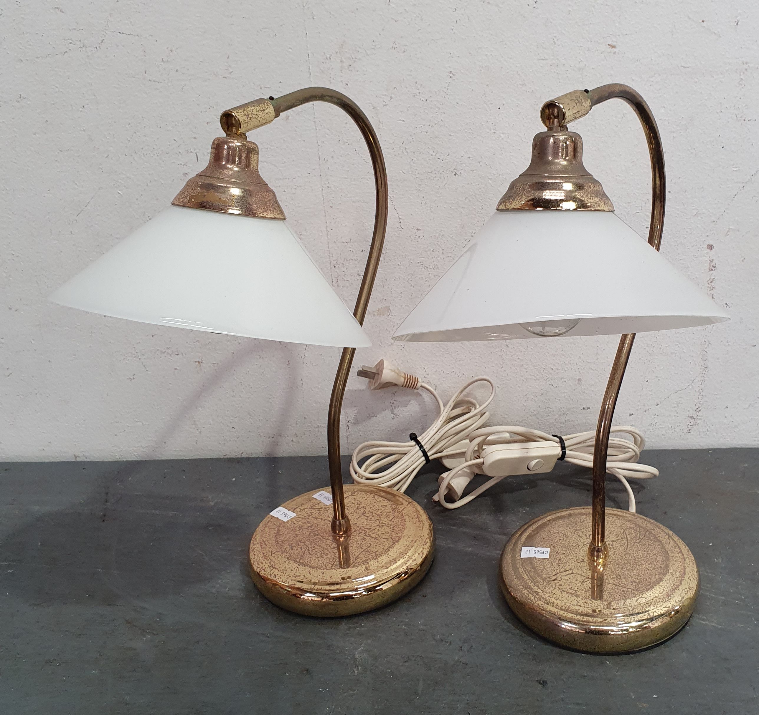 A Pair Of Glass And Brass Table Lamps