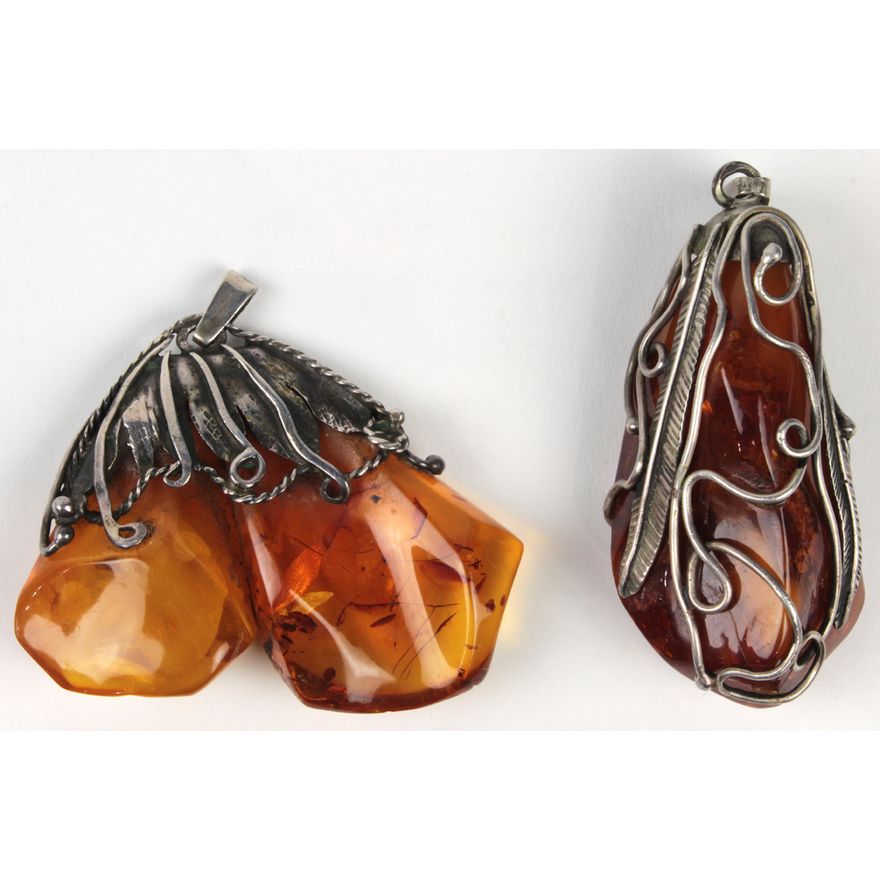 (Lot of 2) Amber and silver pendants