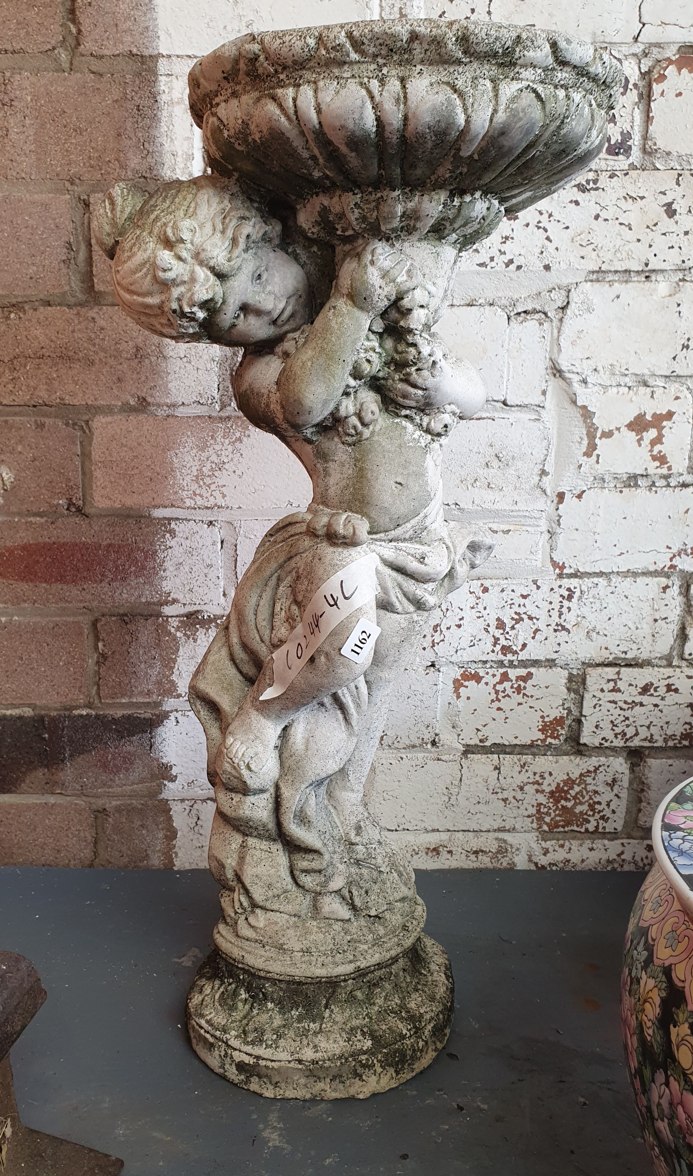 1162 · A DECORATIVE CONCRETE BIRDBATH