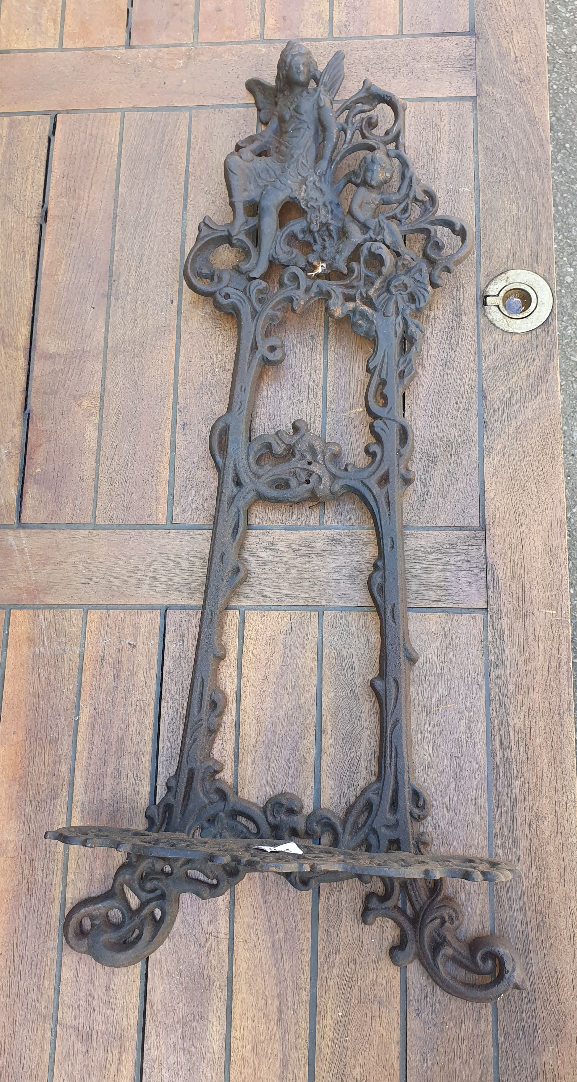 A Decorative Cast Metal Wall Hanging 60cm X 25cm