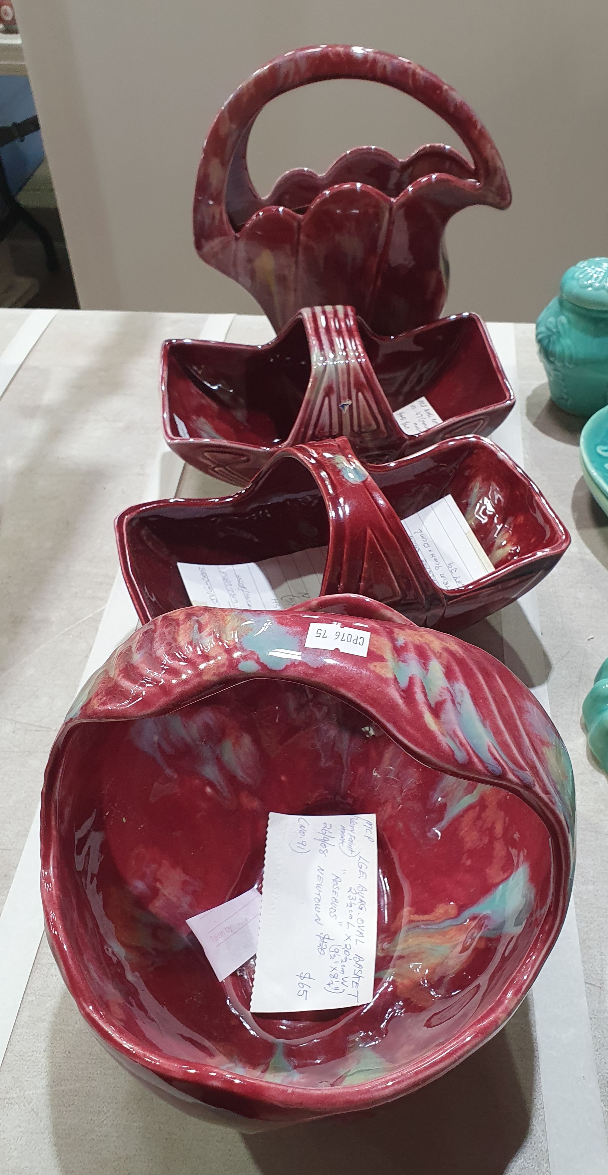 447 · A GROUP OF VARIOUS MCP MINGAY BASKETS IN THE BURGUNDY DRIP GLAZE COLOURWAY