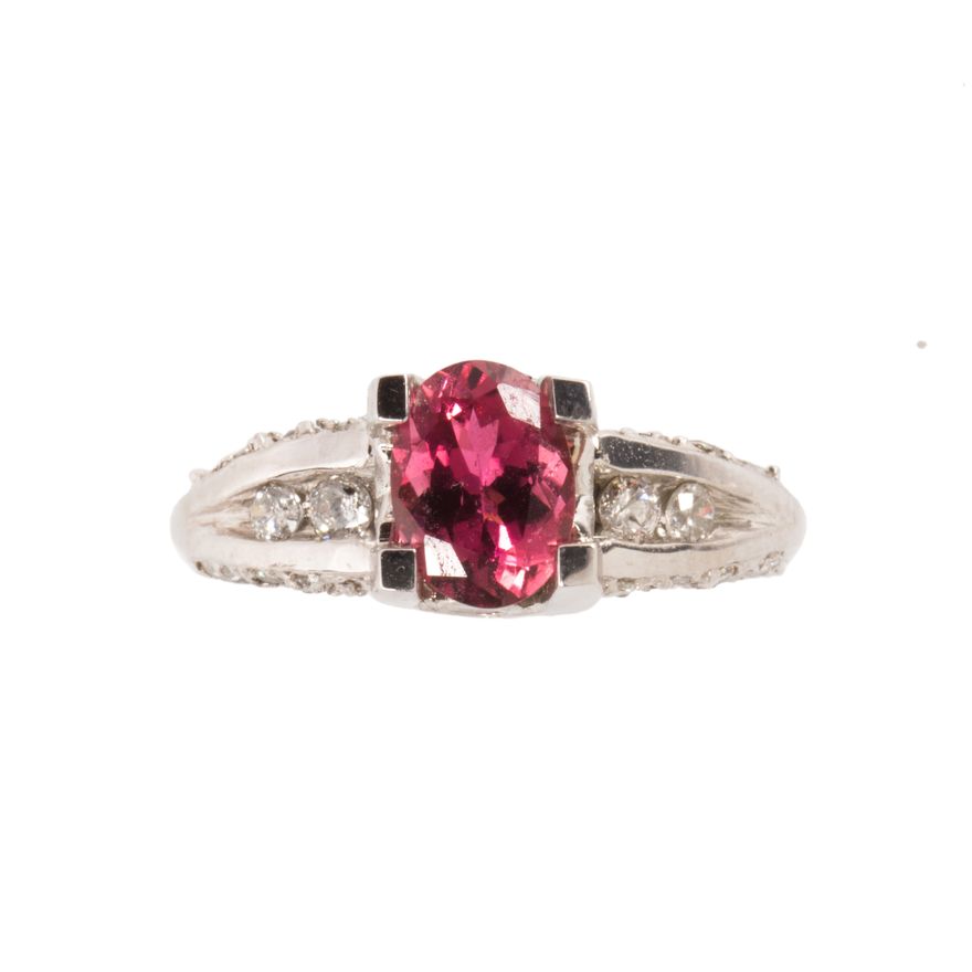 A pink tourmaline, diamond and fourteen karat white gold ring