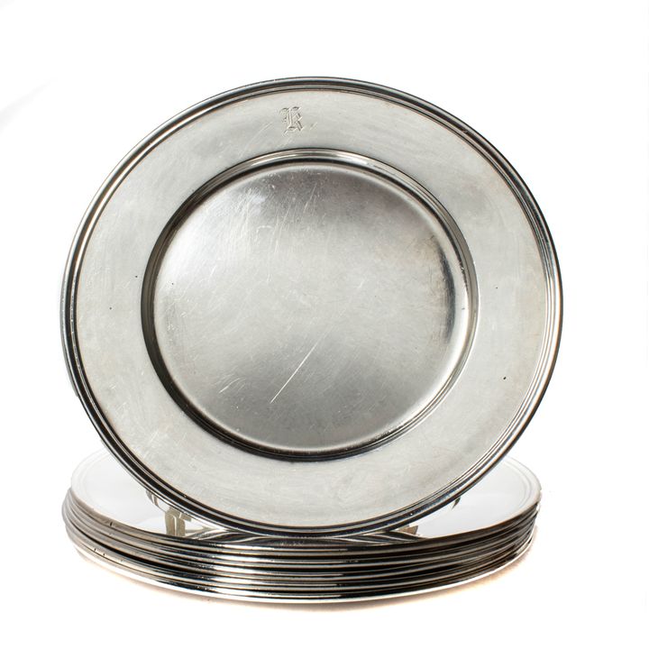 A (Set of 6) Tiffany & Co sterling bread & butter dishes