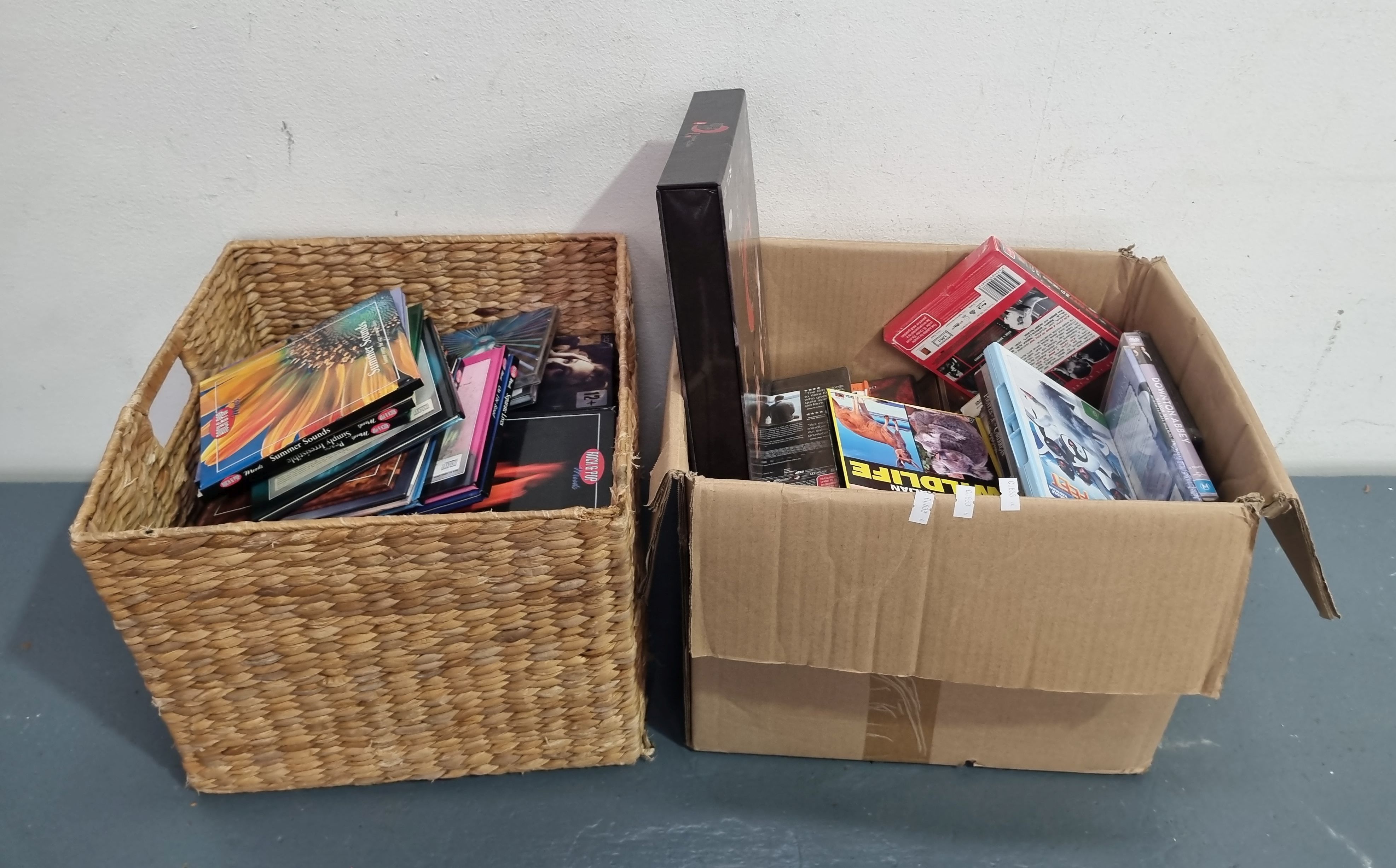 Two Boxes Of Dvds & Cds