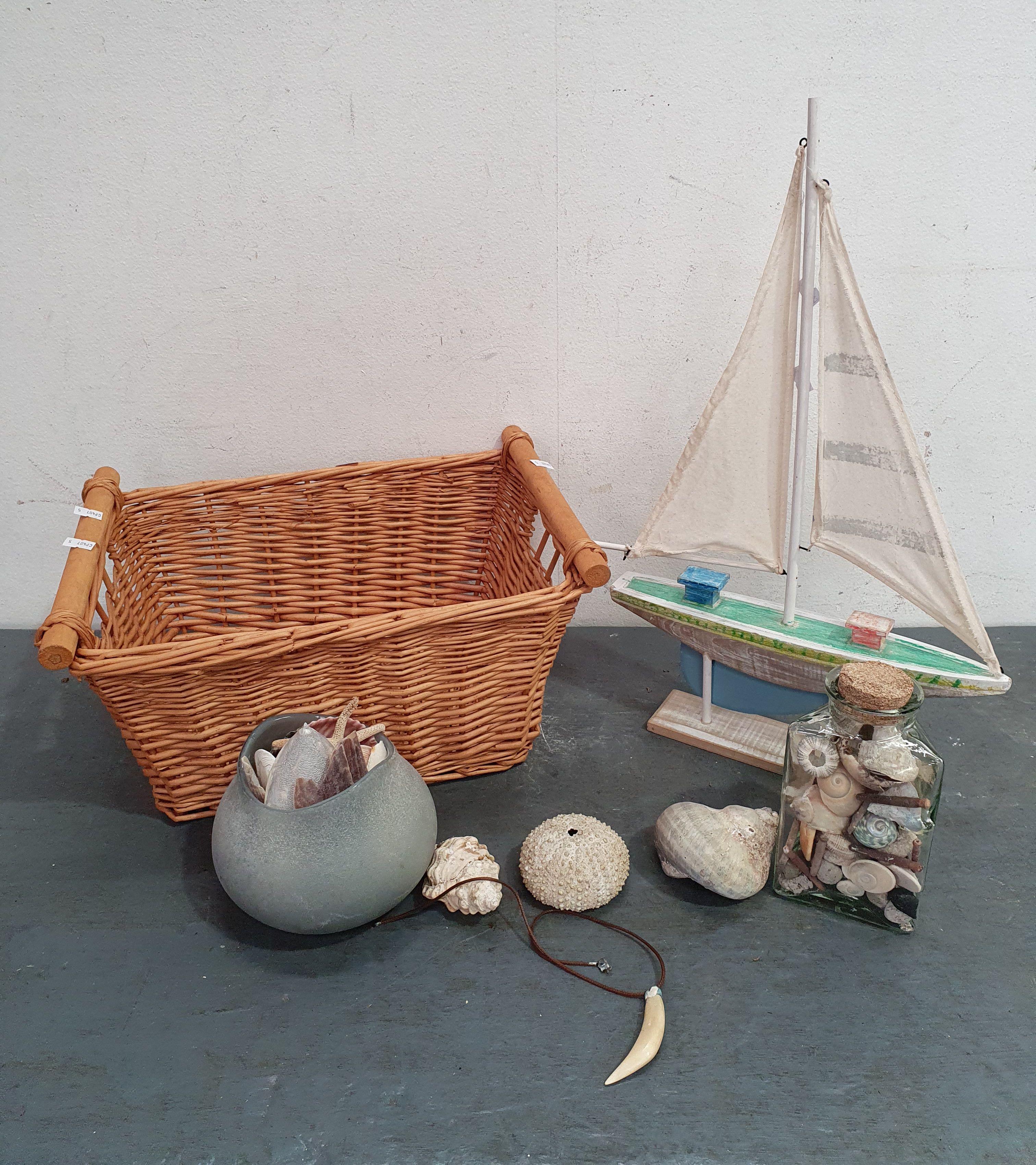 1223 · A BASKET OF SHELLS AND BOATS