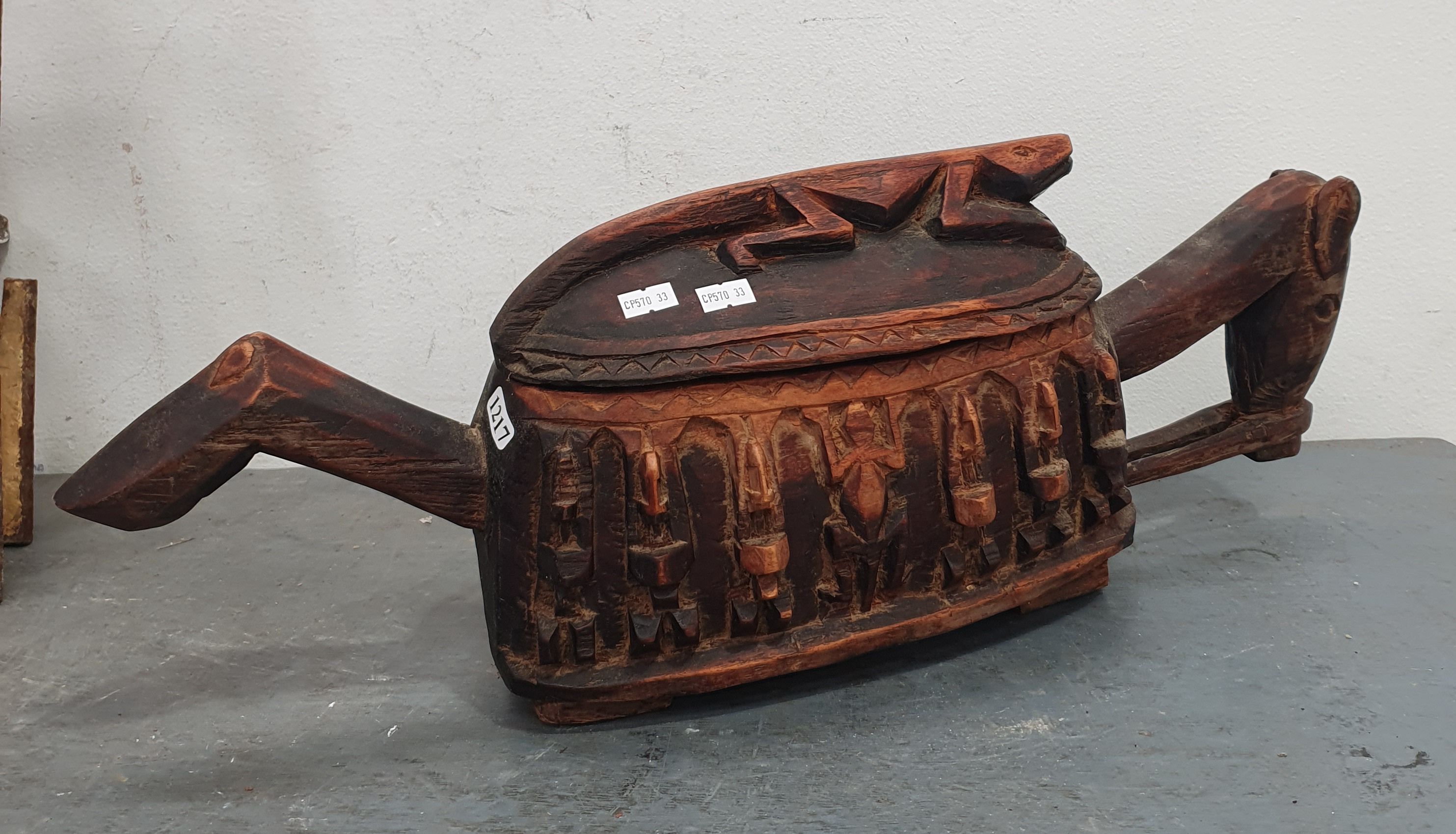 A CARVED WOODEN CENTREPIECE