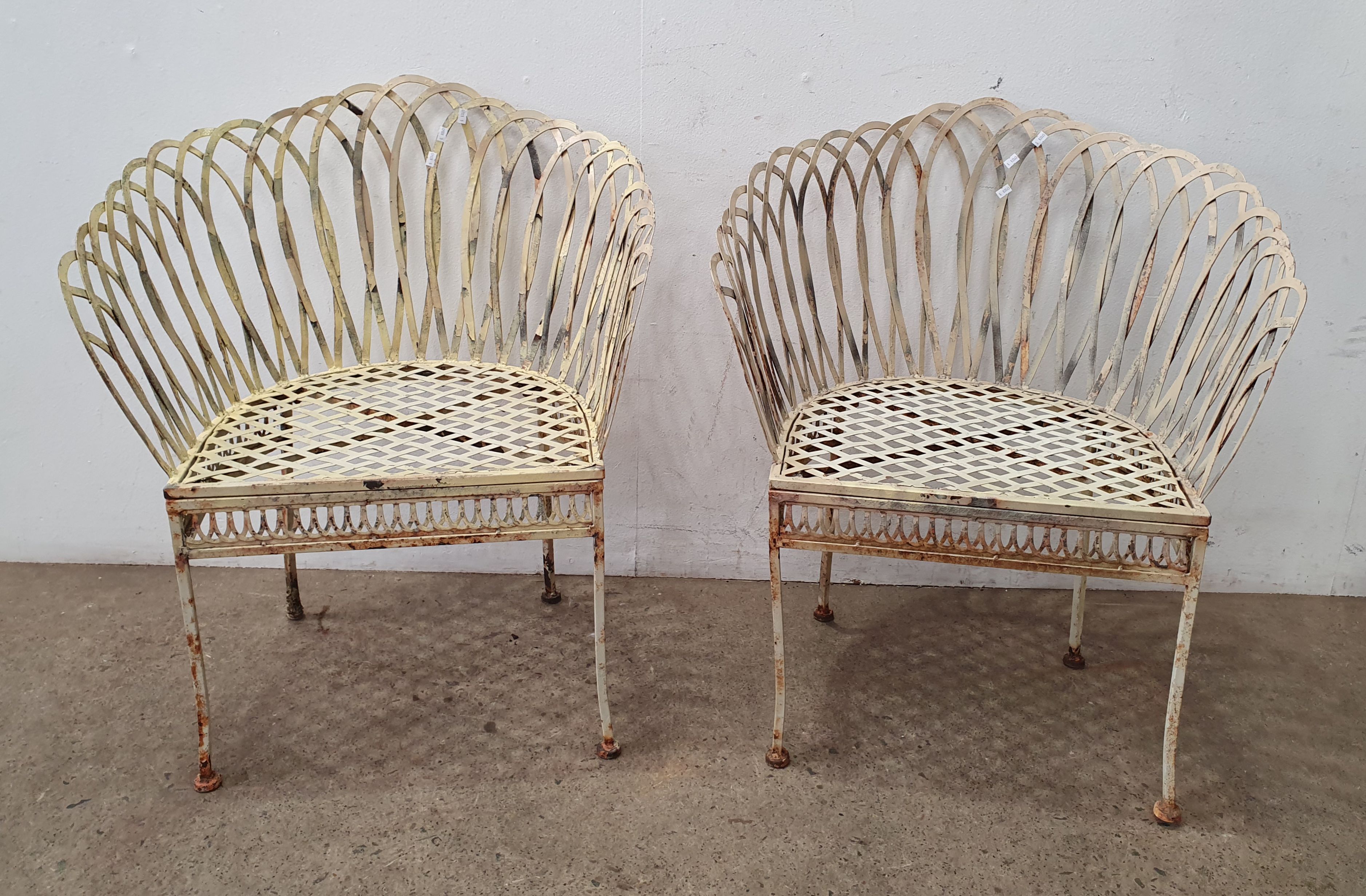 A Pair Of Metal Chairs