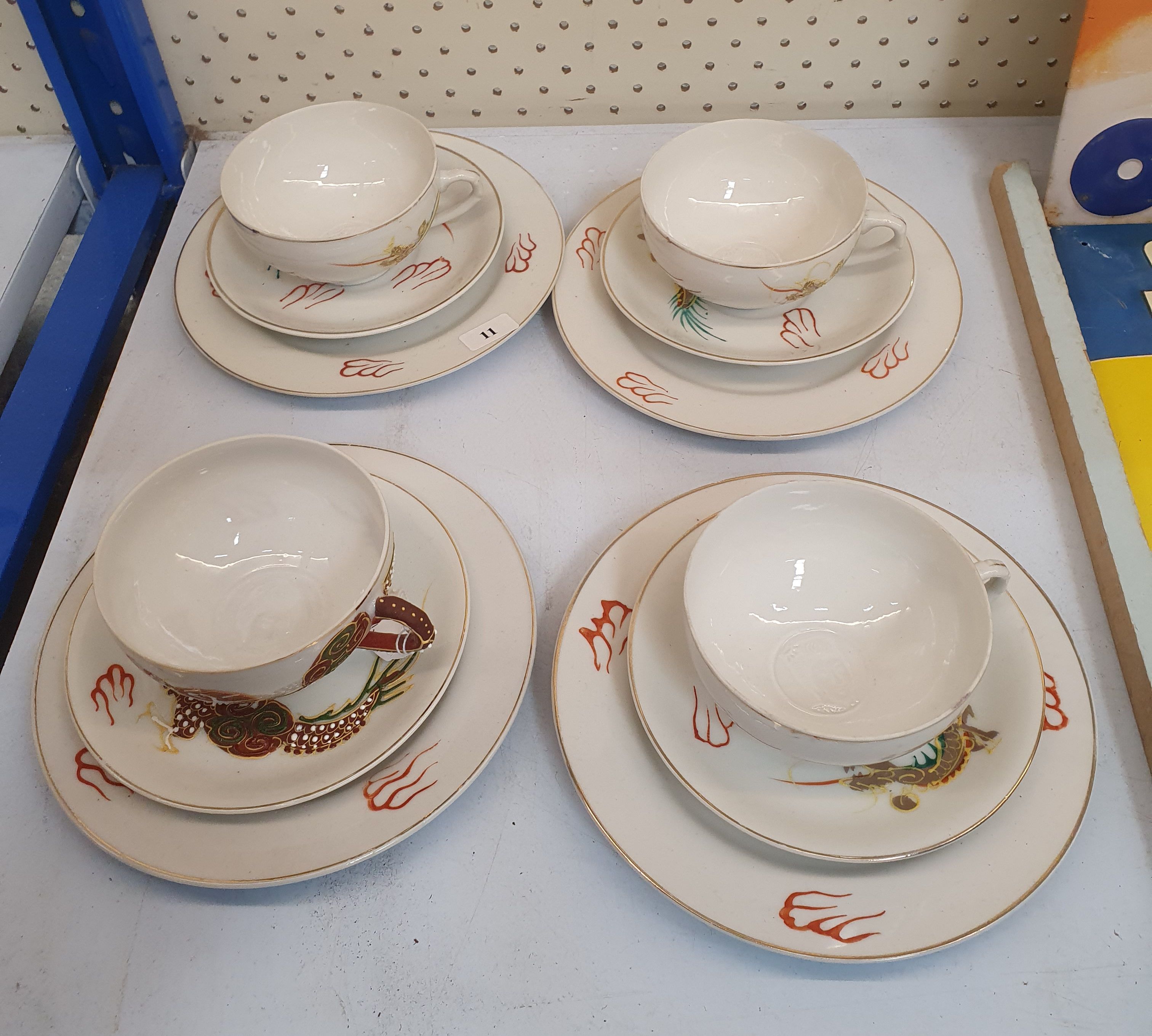 16 · THREE VINTAGE JAPANESE LITHOPHANE TEACUPS AND SAUCERS