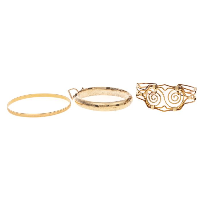 A Trio of Gold Bangles & Cuff