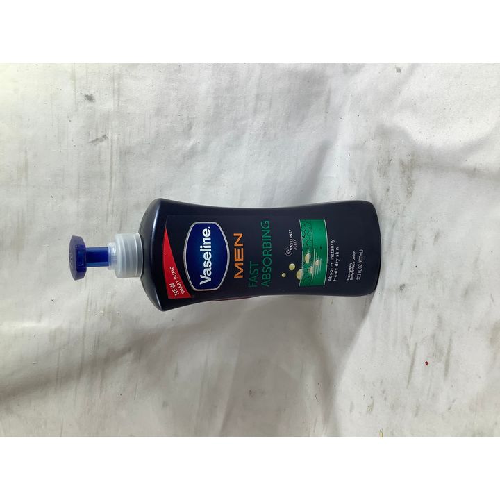 Vaseline Men Fast Absorbing Heals Dry Skin Body & Face Lotion 20.3oz