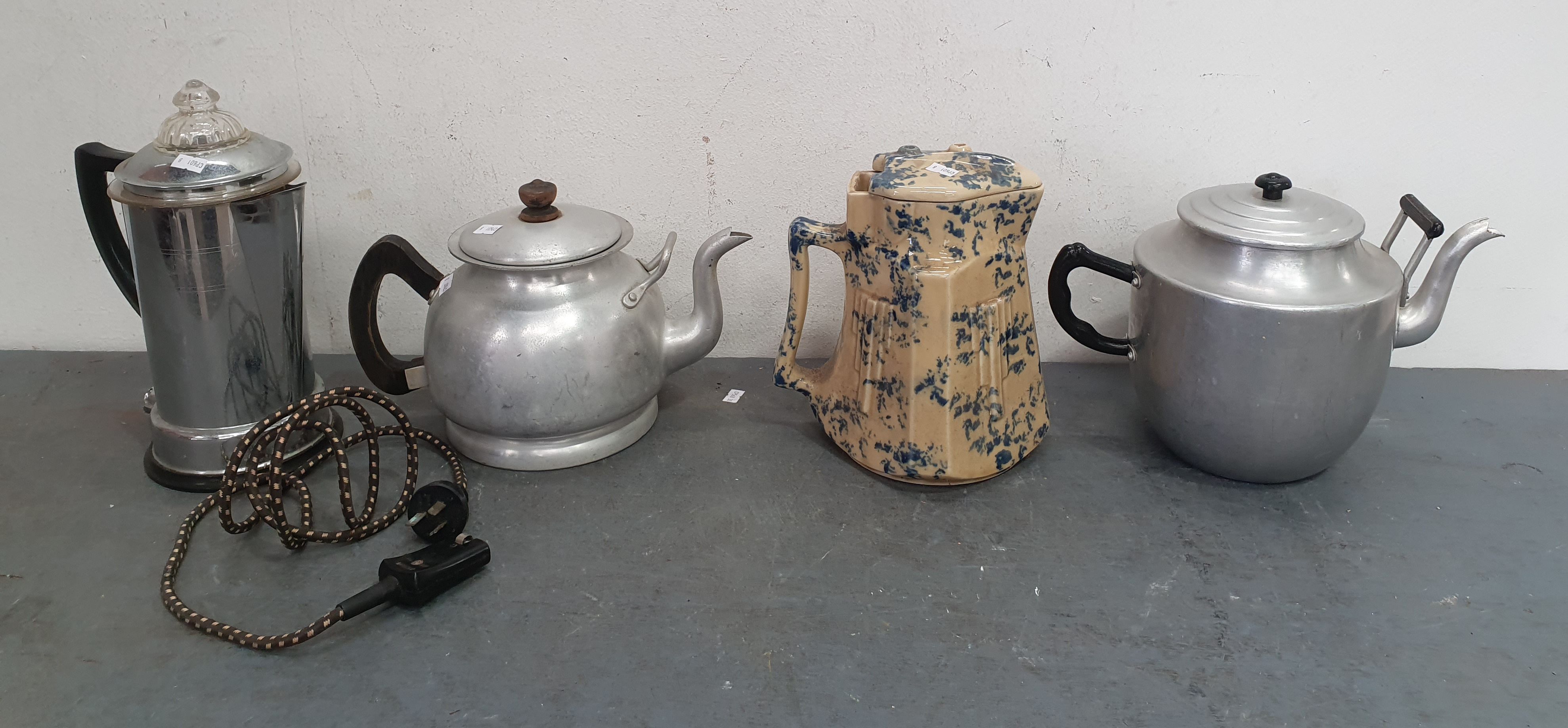 1268 · A GROUP OF VARIOUS JUGS AND KETTLES