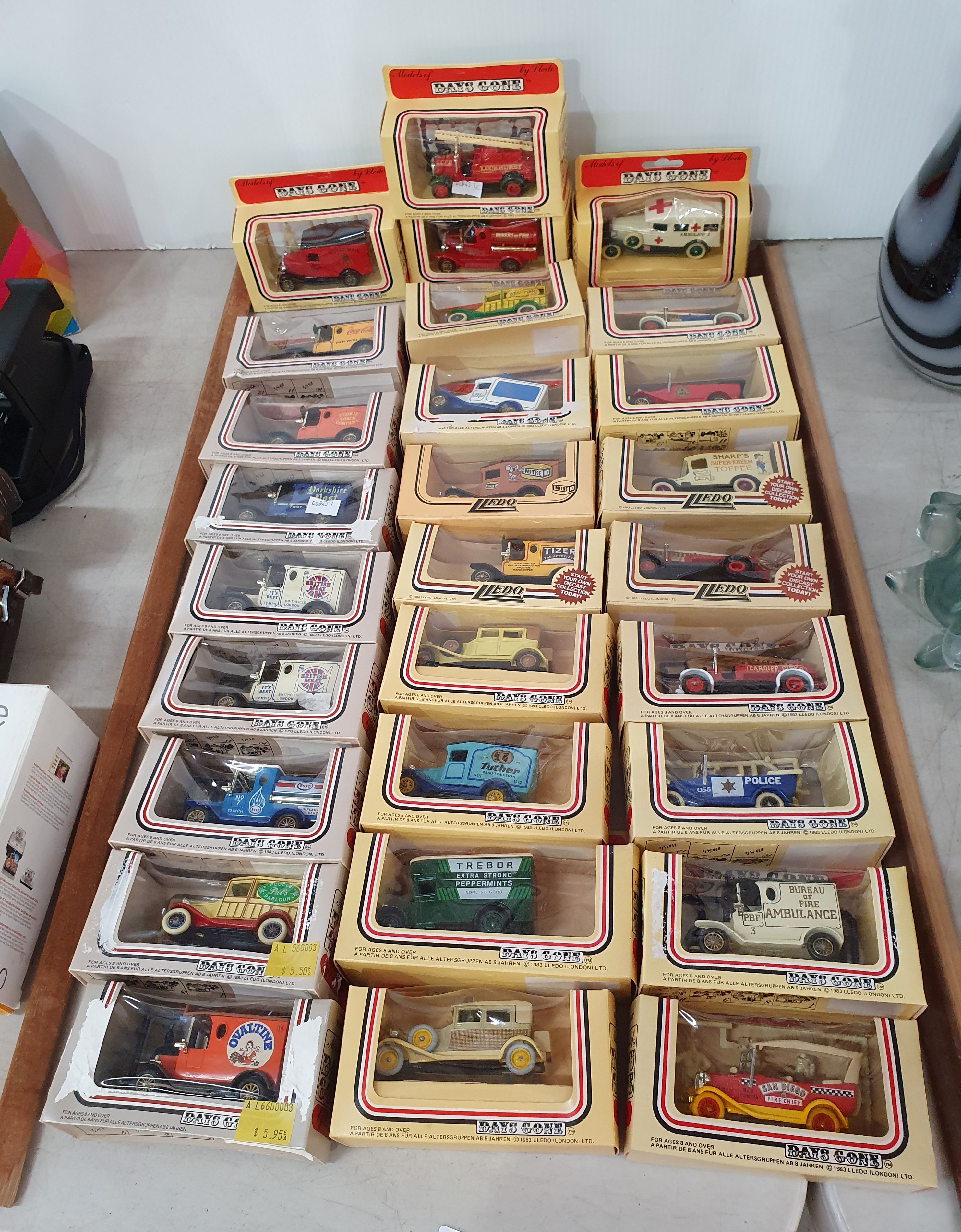 134 · 28 'DAYS GONE' DIE-CAST MODEL EMERGENCY SERVICES AND DELIVERY VEHICLES