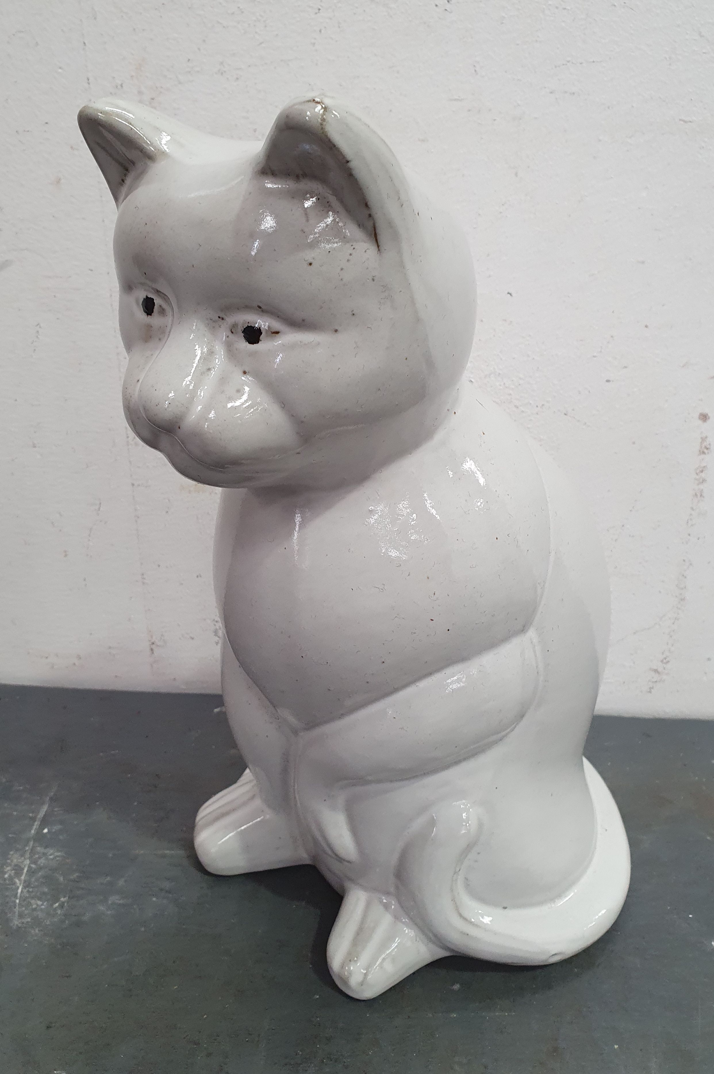 1320 · A CERAMIC CAT STATUE