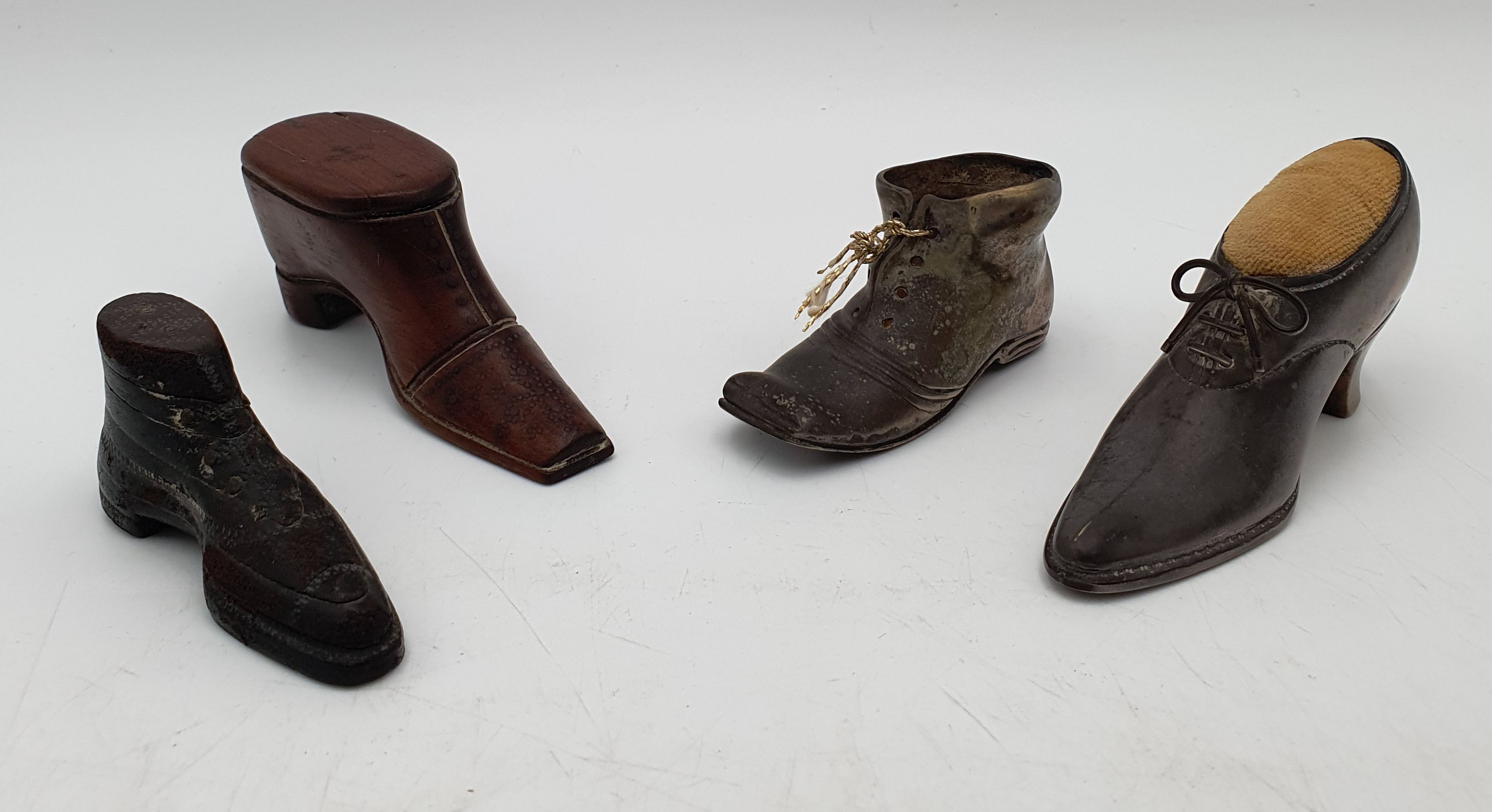 510 · TWO VINTAGE SILVER SHOE FORM PIN CUSHIONS