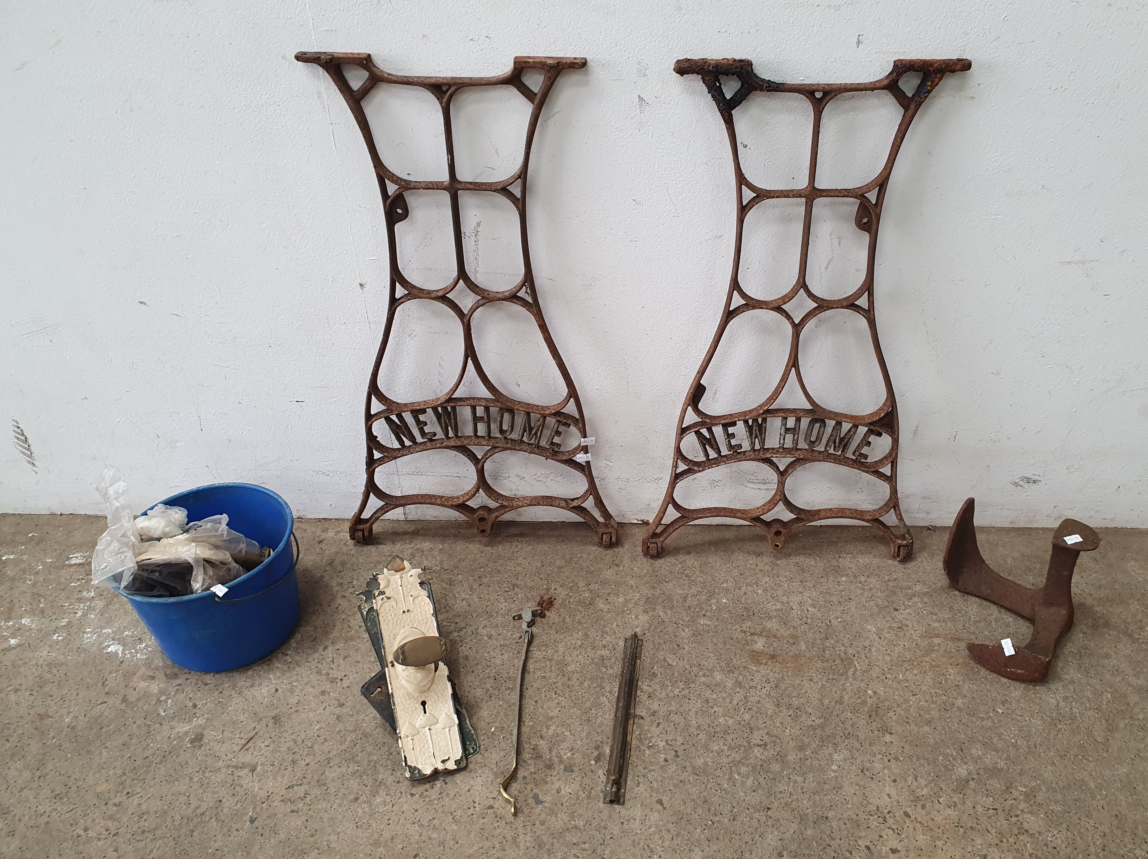 A GROUP OF IRON PARTS AND VINTAGE DOORKNOBS