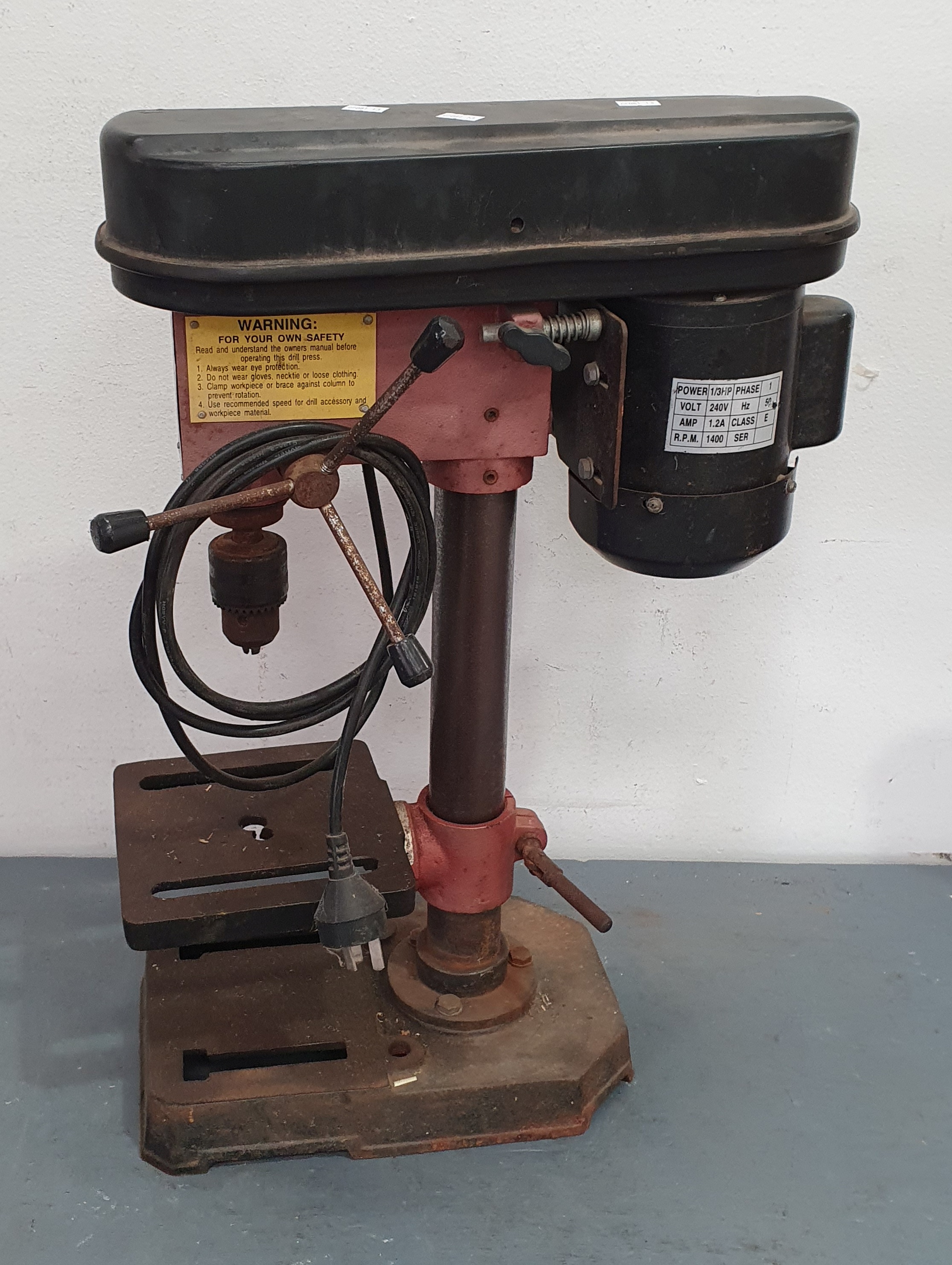 A DRILL PRESS