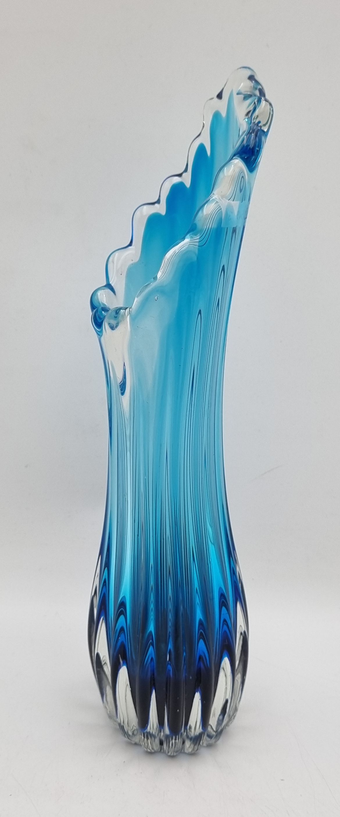 AN ART GLASS BLUE SWUNG VASE