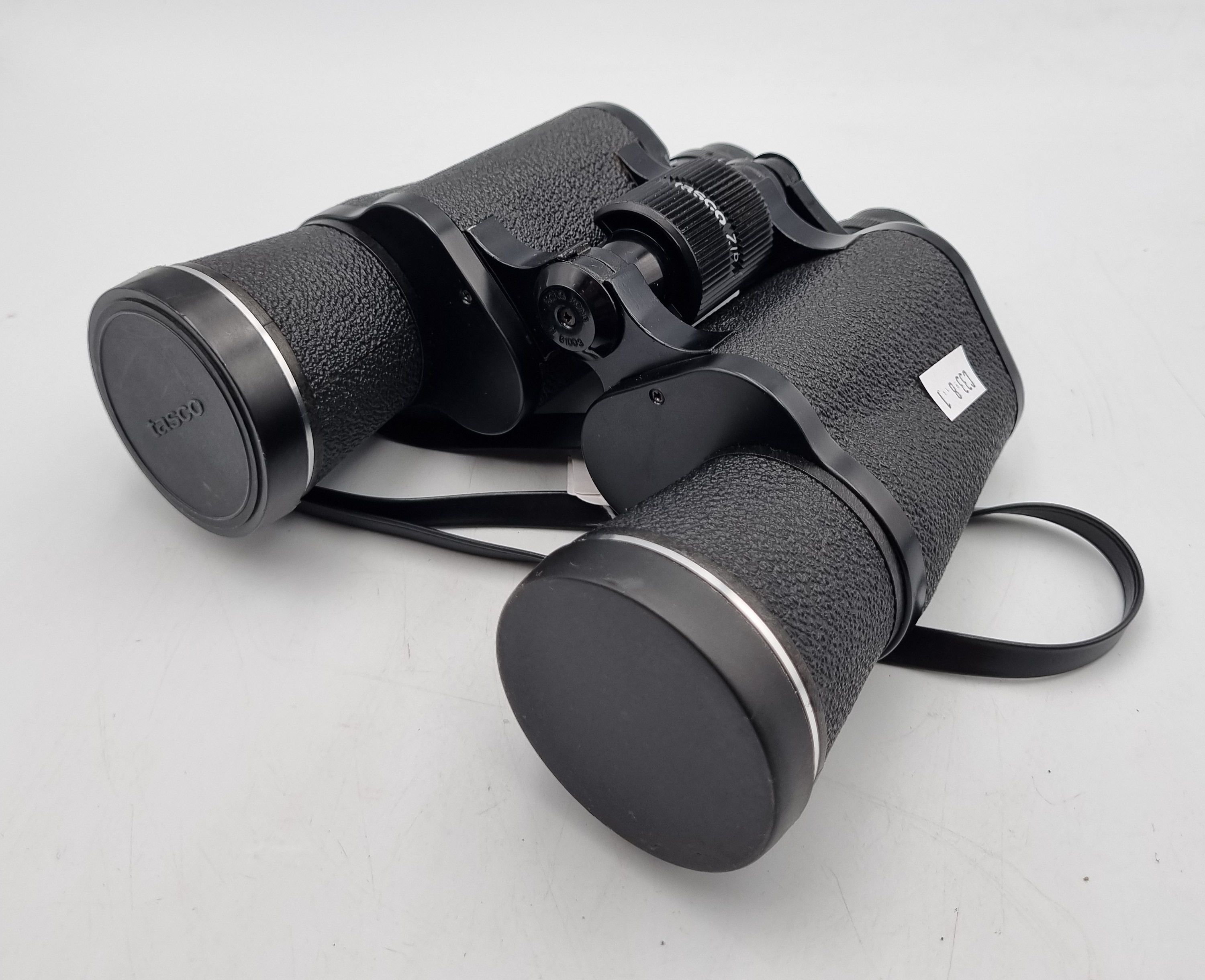 16 · A PAIR OF TASCO ZIP FOCUS BINOCULARS