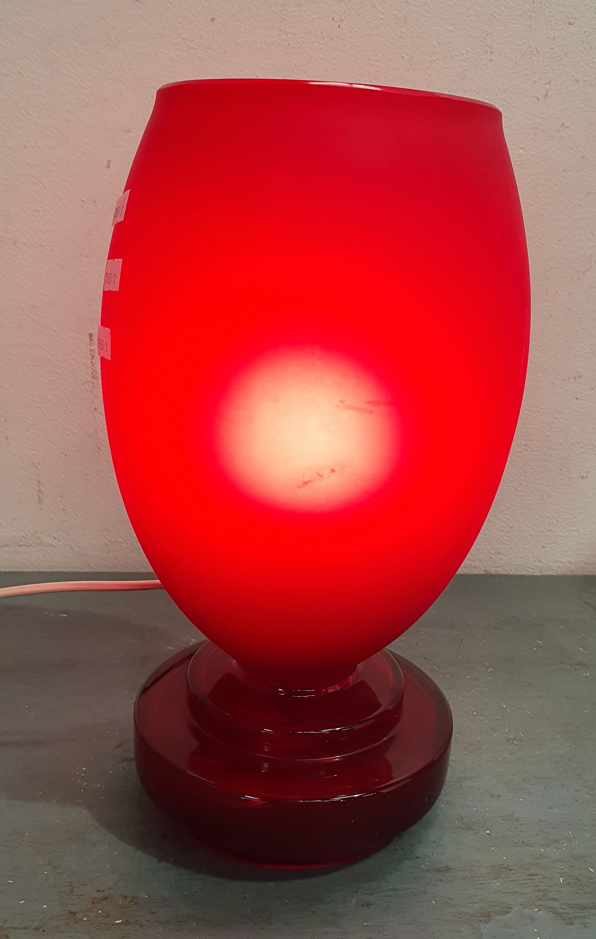 1294 · A RED GLASS TABLE LAMP