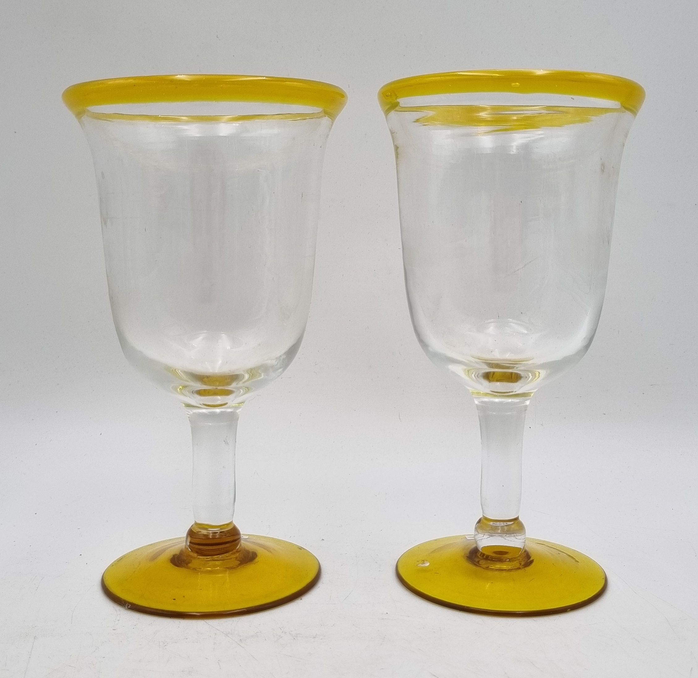 654 · A PAIR OF HAND-BLOWN GLASS GOBLETS