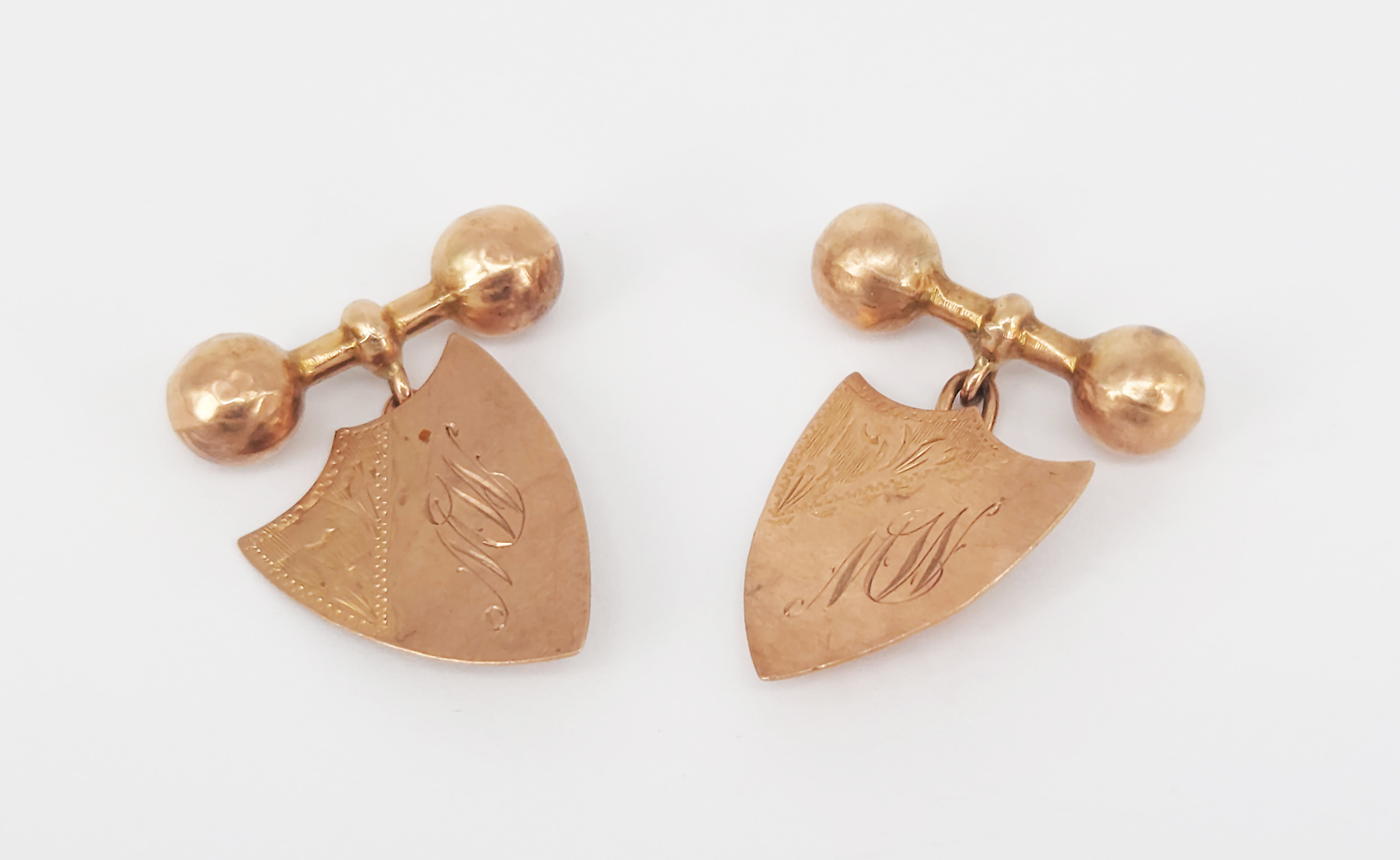A Pair Of Australian 9ct Gold Shield And Dumbbell Cufflinks