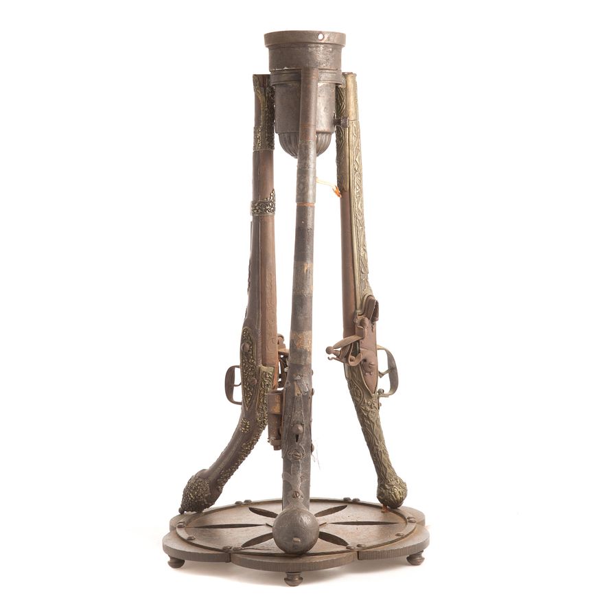 Lamp made from three flintlock pistols
